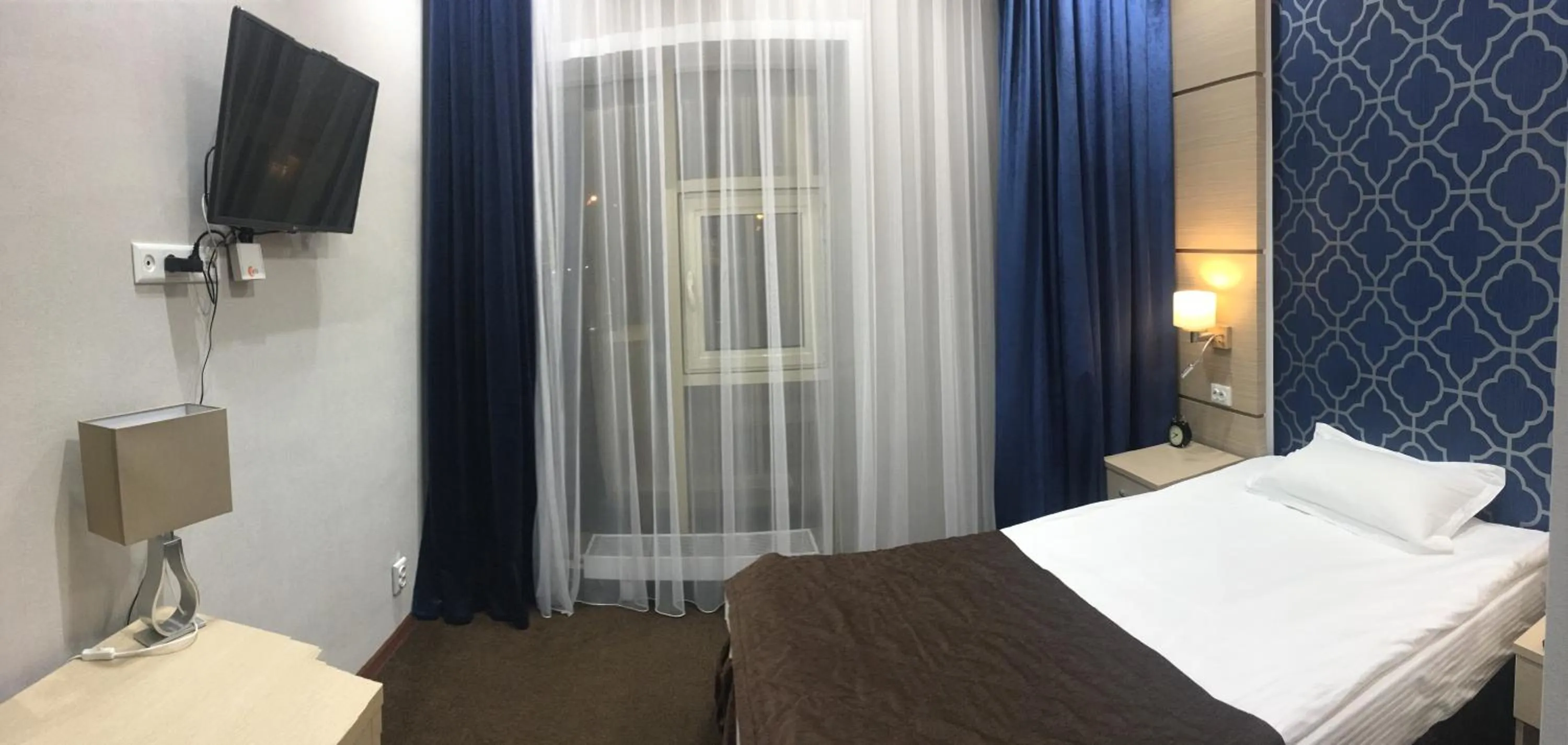 Bed in Orynbor Boutique Hotel