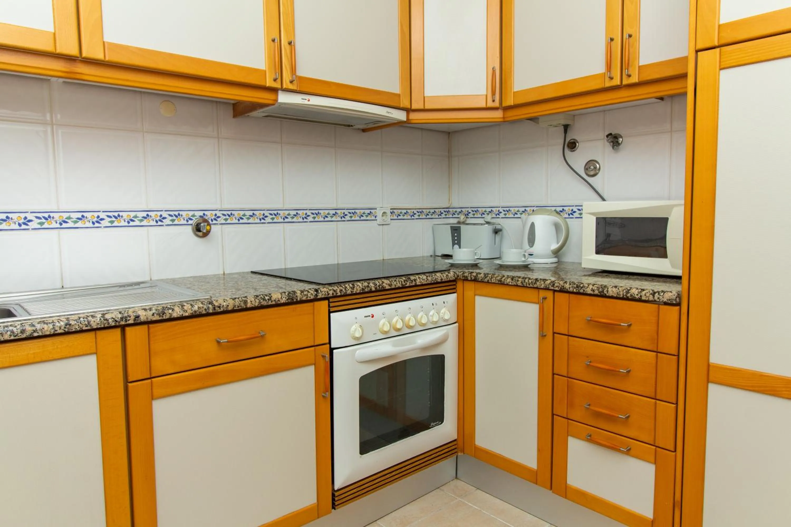 Kitchen or kitchenette in Vila do Castelo