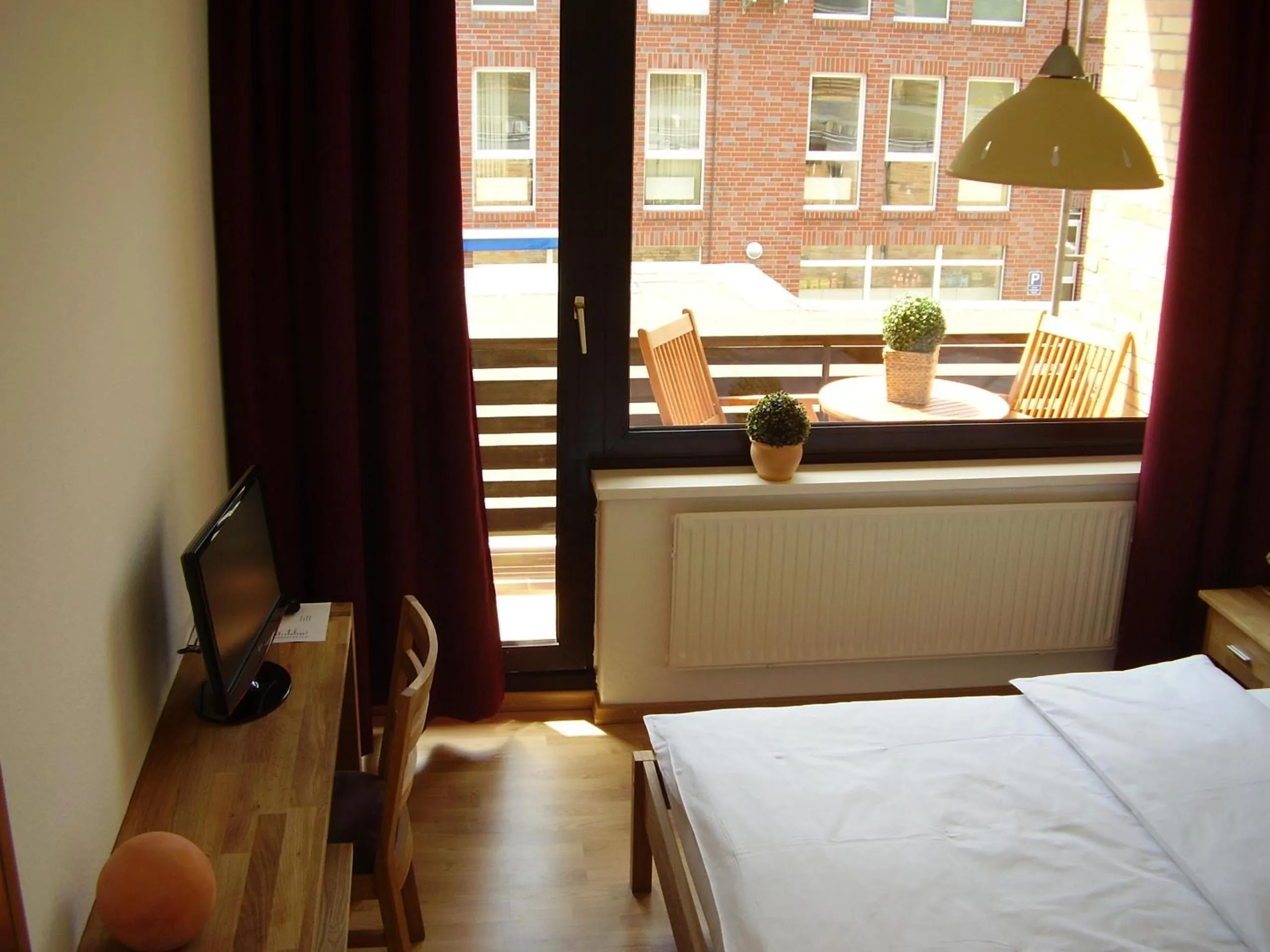 Photo of the whole room, Bed in City Hotel Gifhorn