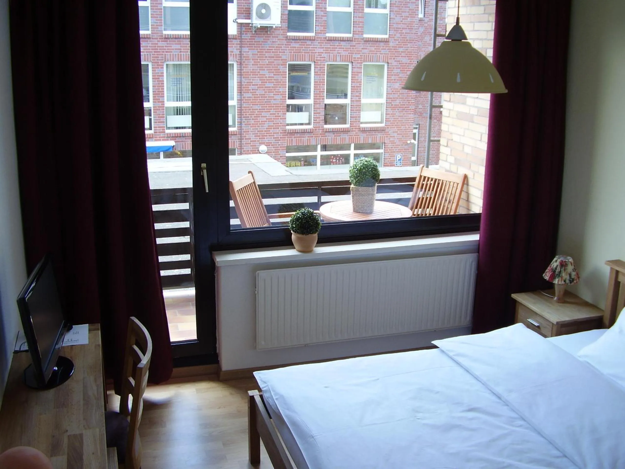 Photo of the whole room, Bed in City Hotel Gifhorn