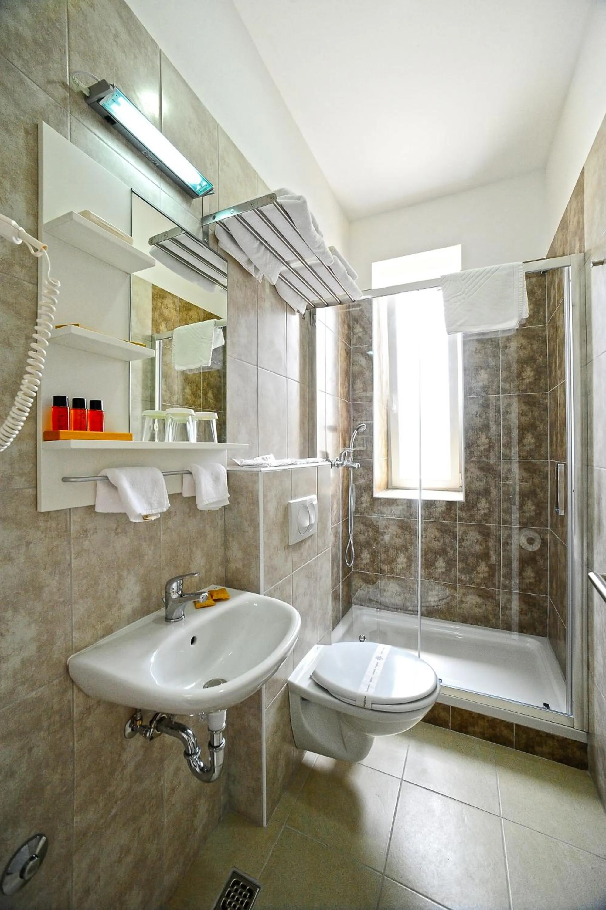 Bathroom in Valenti rooms