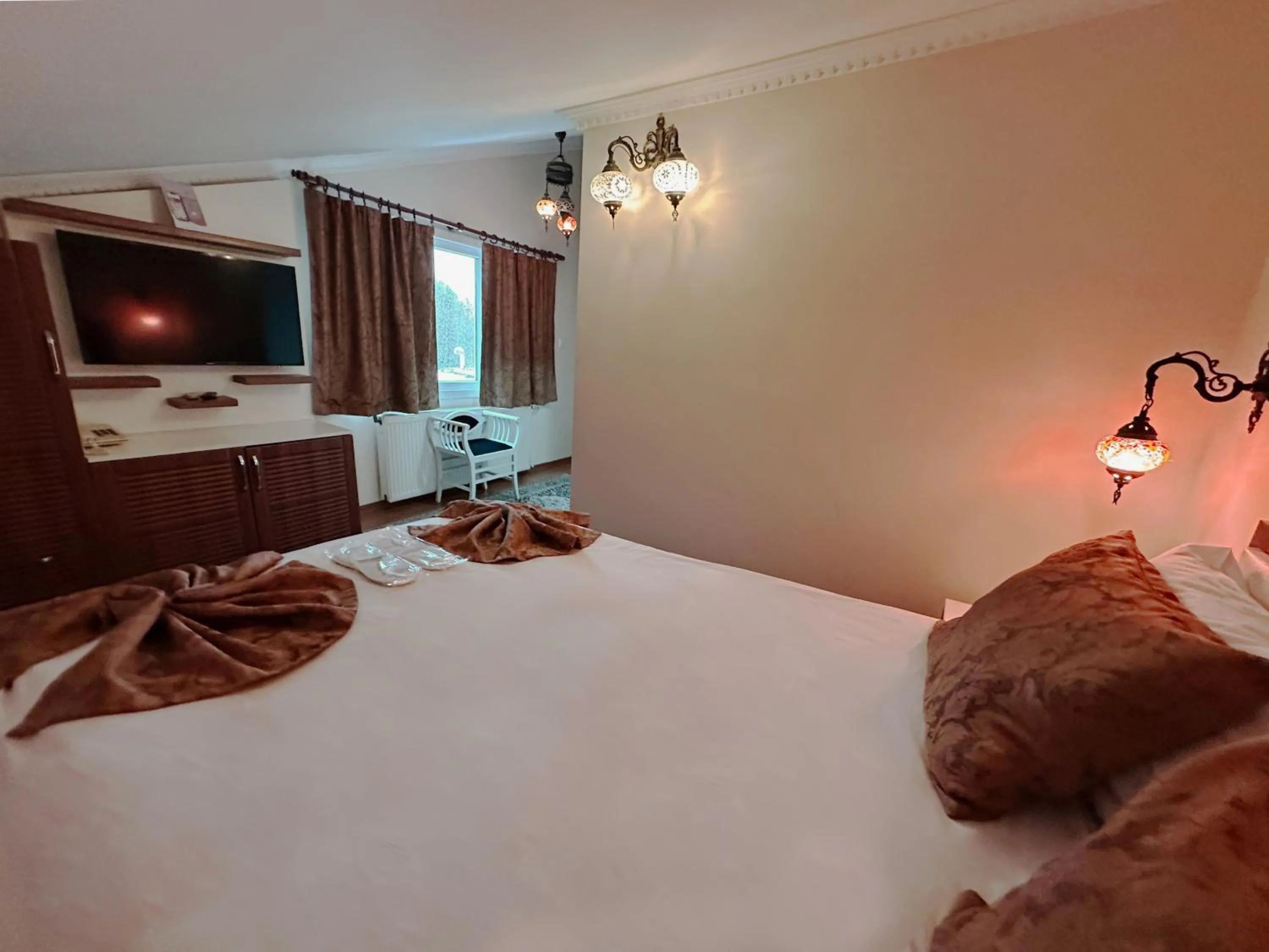 Bed in Modern Sultan Hotel