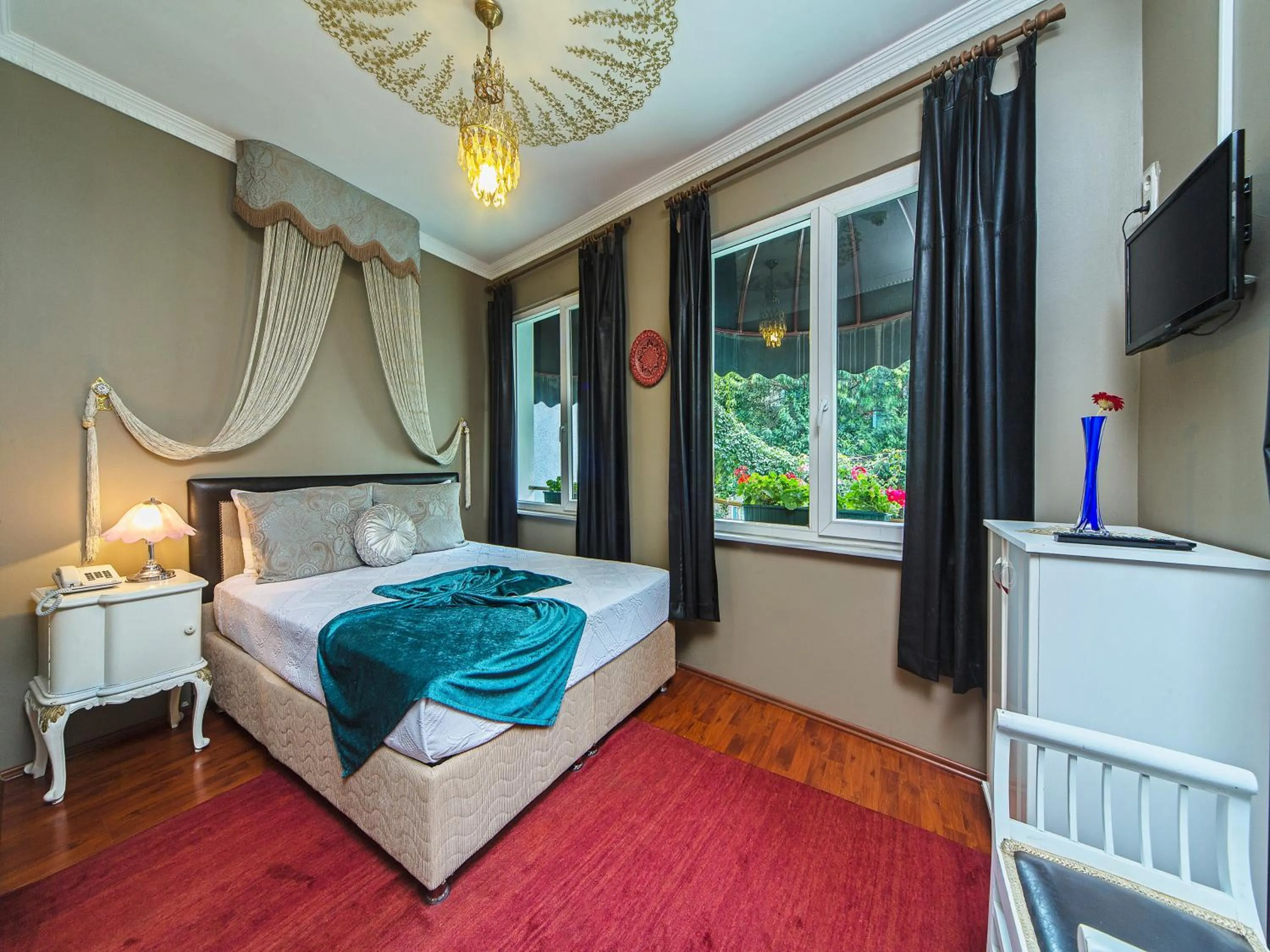 Photo of the whole room, Bed in Modern Sultan Hotel