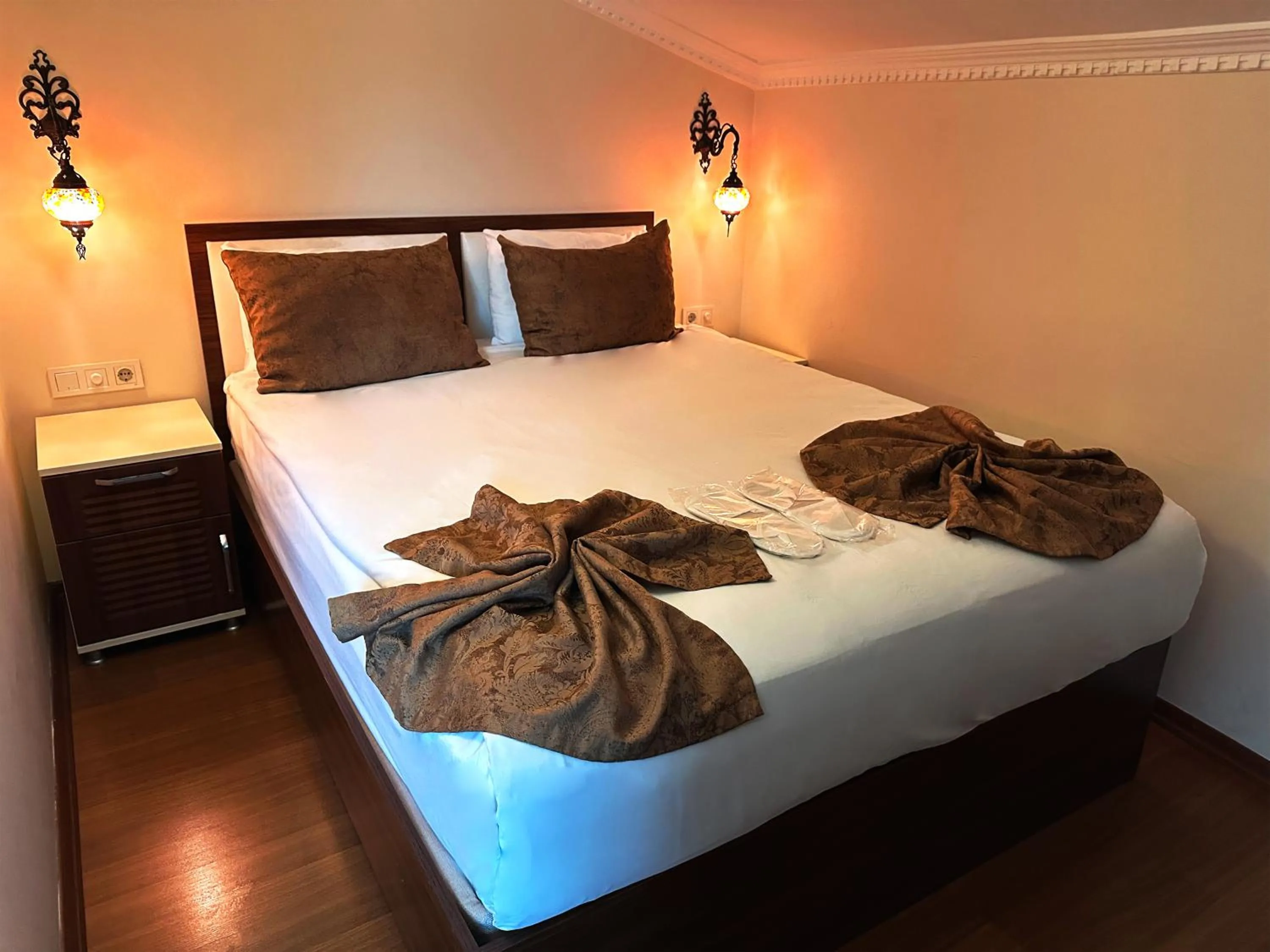 Bed in Modern Sultan Hotel