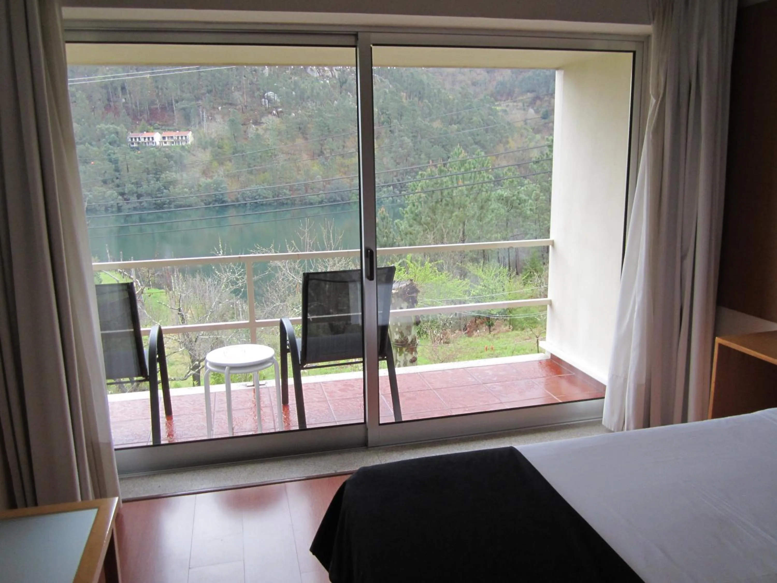 River view, Bed in Hotel Eco Salvador