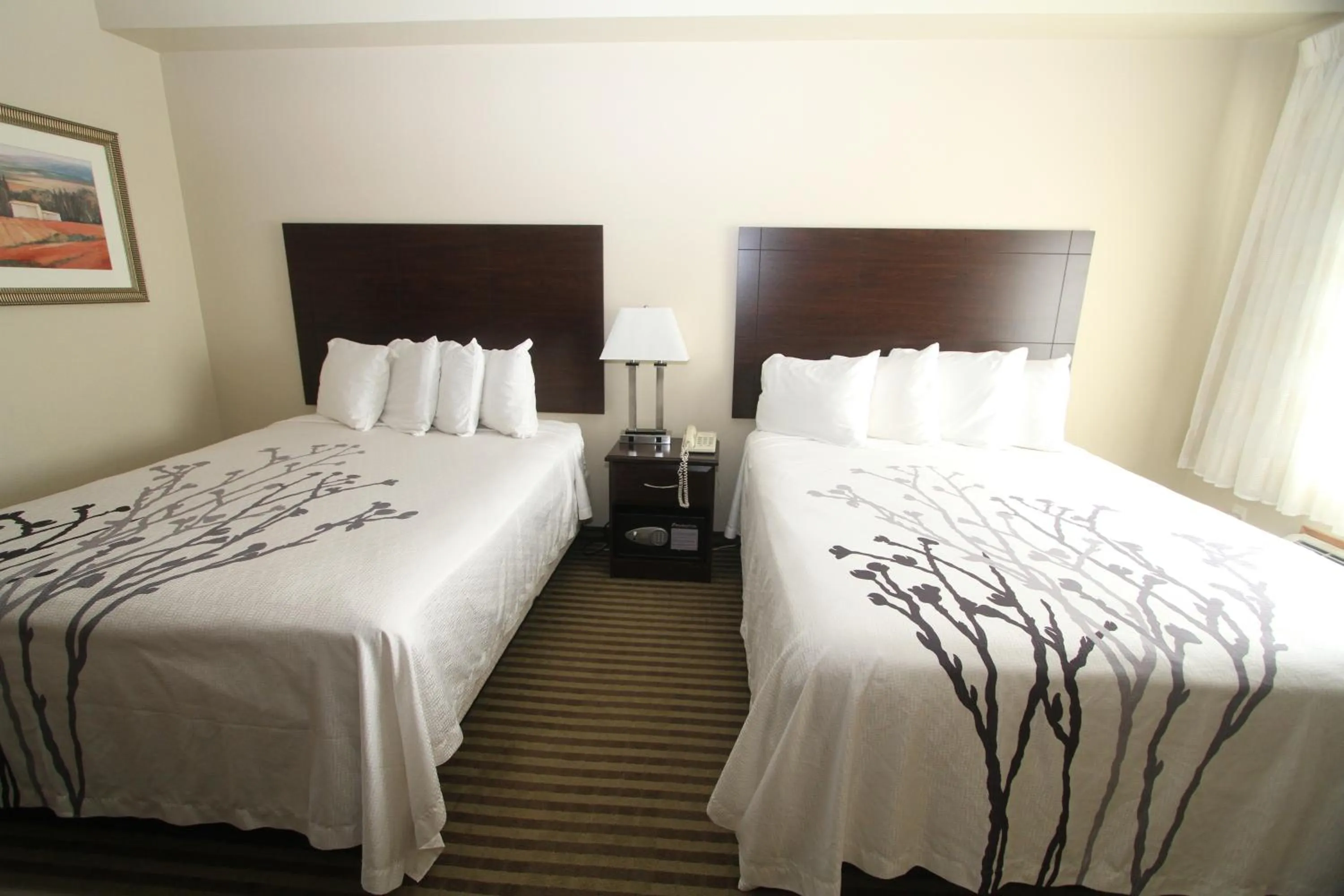 Bed in Bowman Inn and Suites