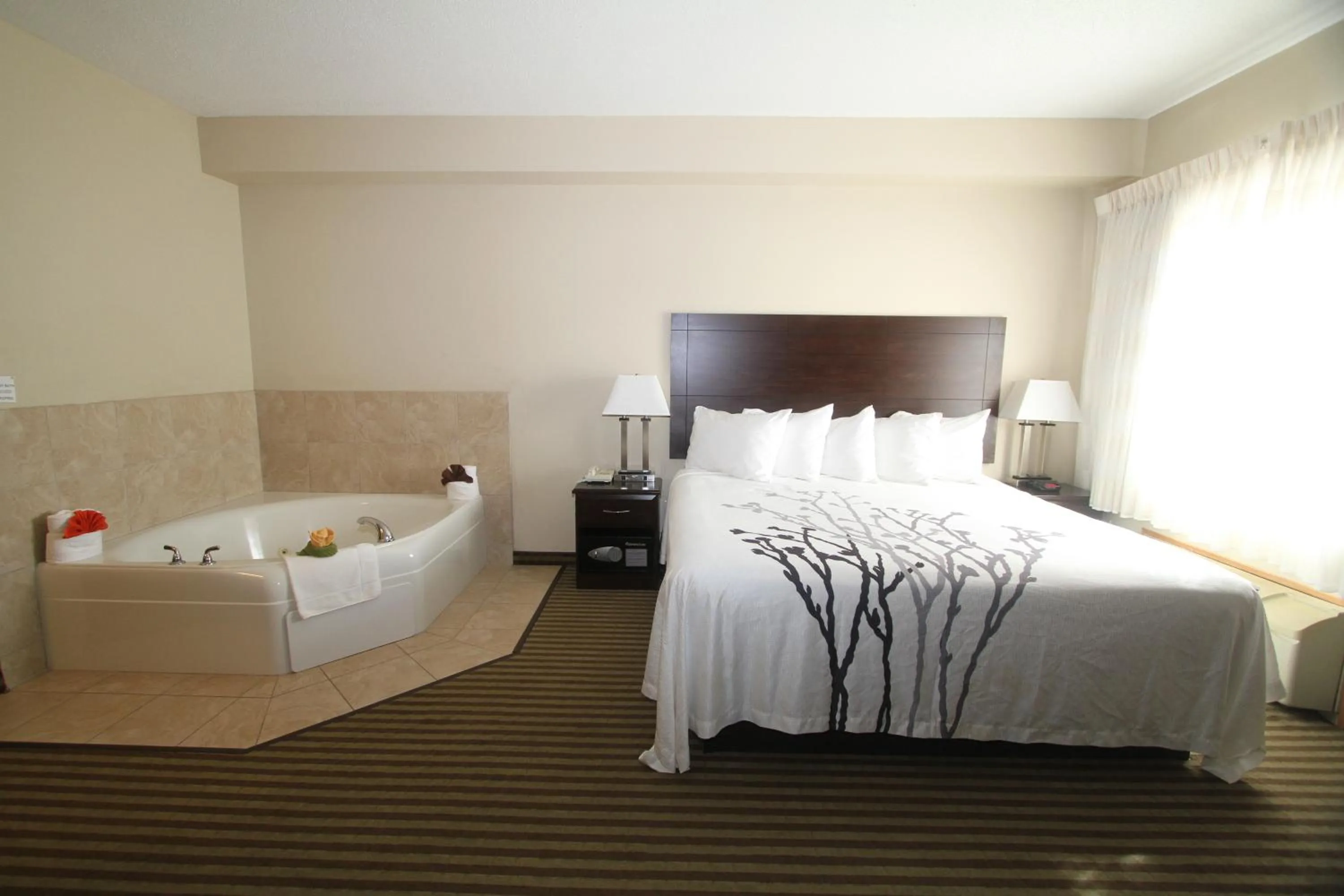 Bed in Bowman Inn and Suites