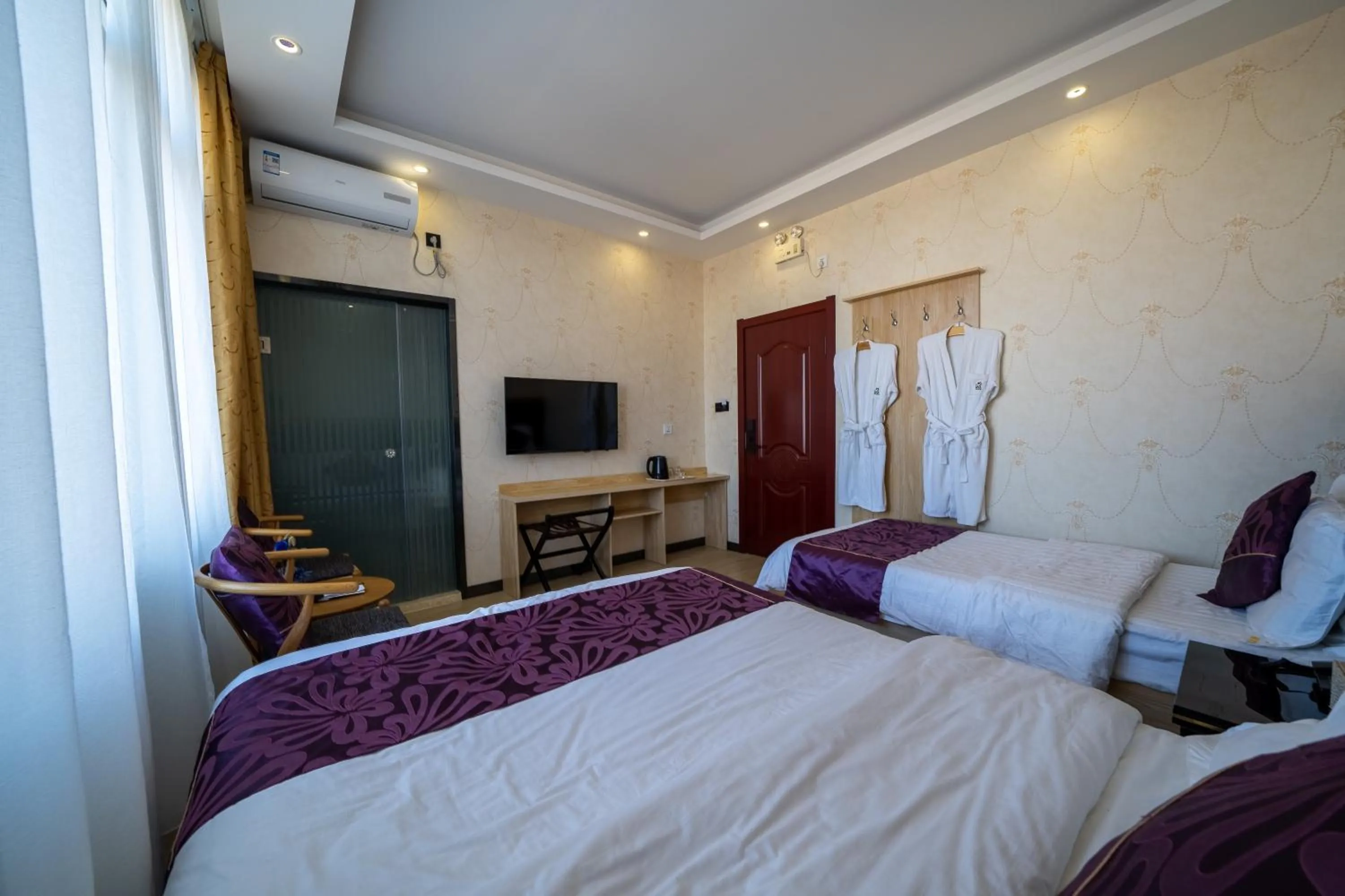 Bed in XinQihang Hotel Harbin Taiping Airport