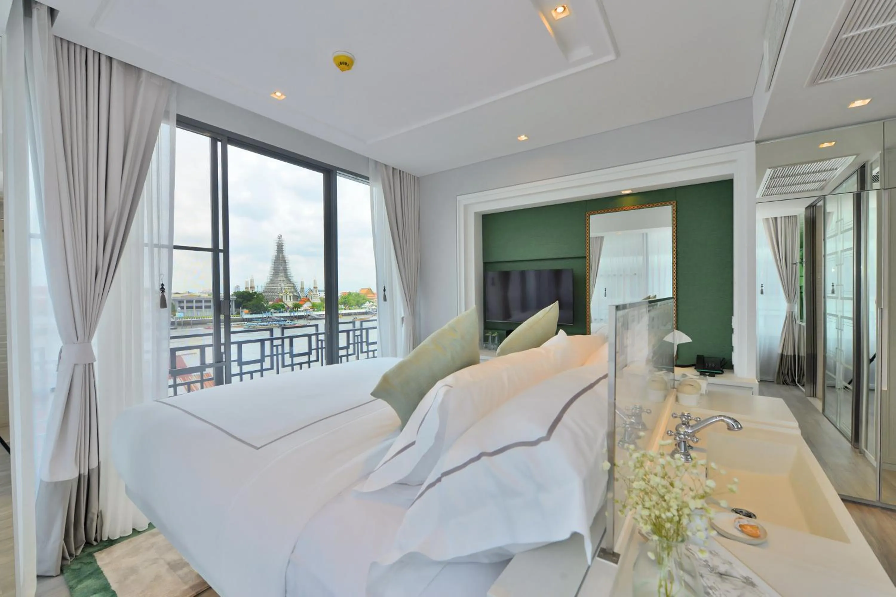 Bed in Riva Arun Bangkok