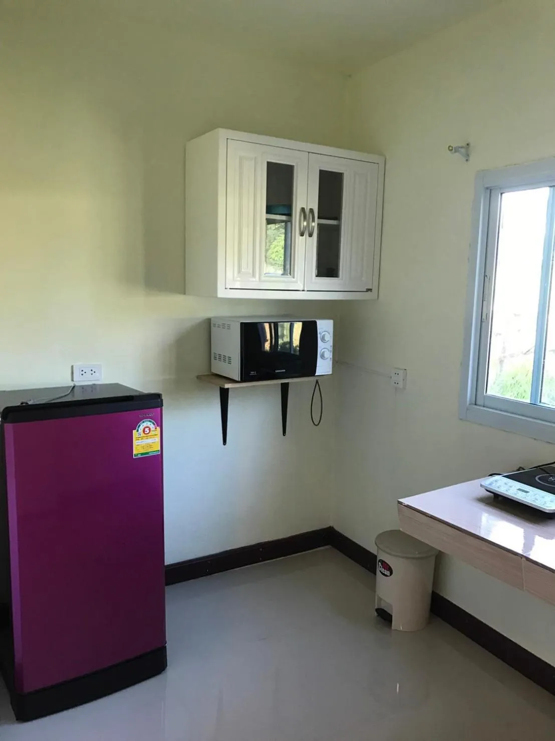 Kitchen or kitchenette in Everest Resort Samui - SHA Plus