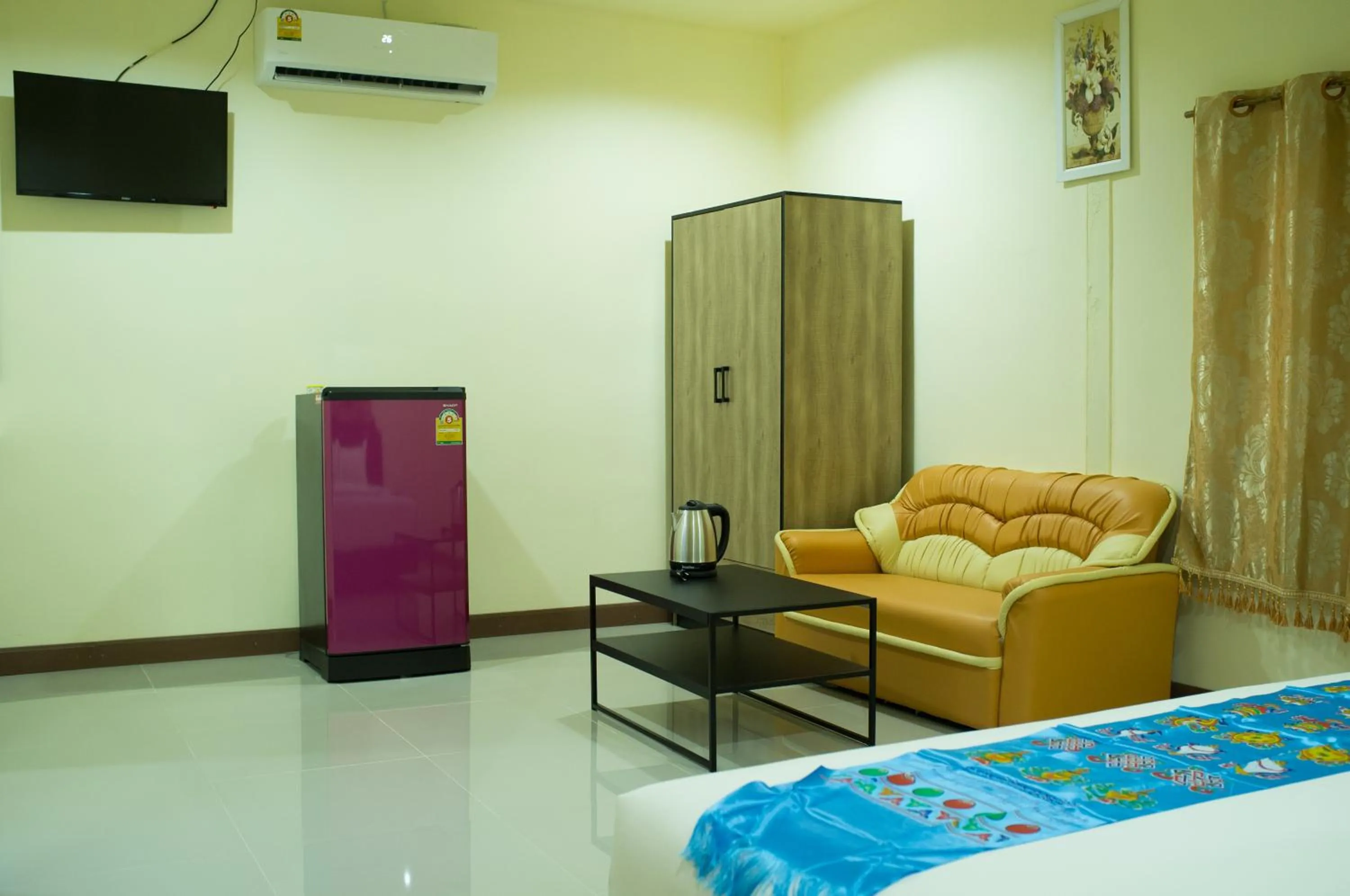 Bed in Everest Resort Samui - SHA Plus