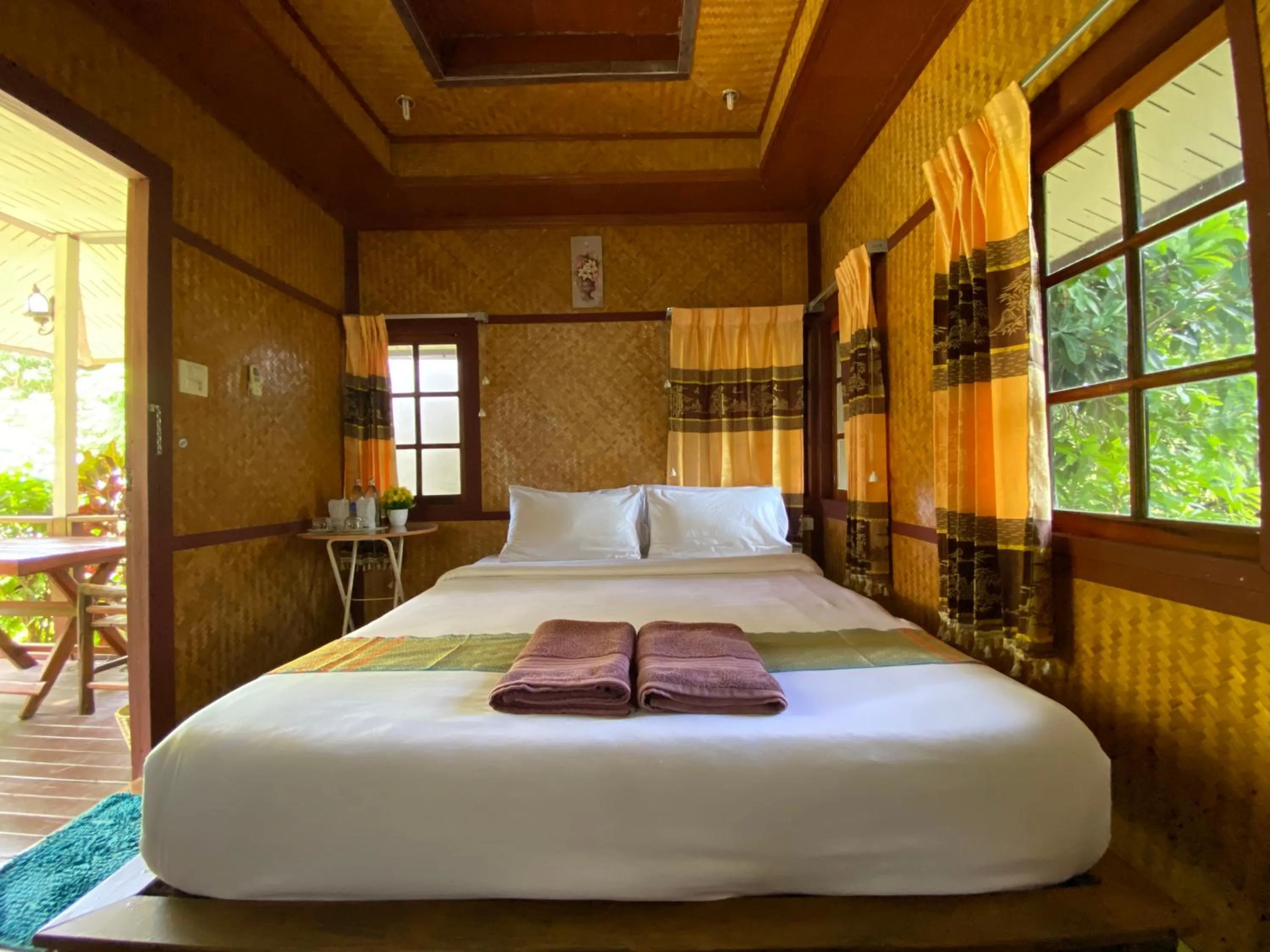 Bed in Everest Resort Samui - SHA Plus