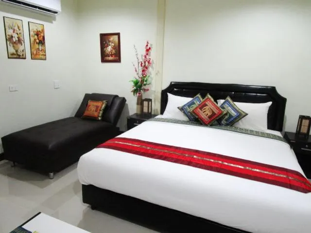 Bed in Everest Resort Samui - SHA Plus