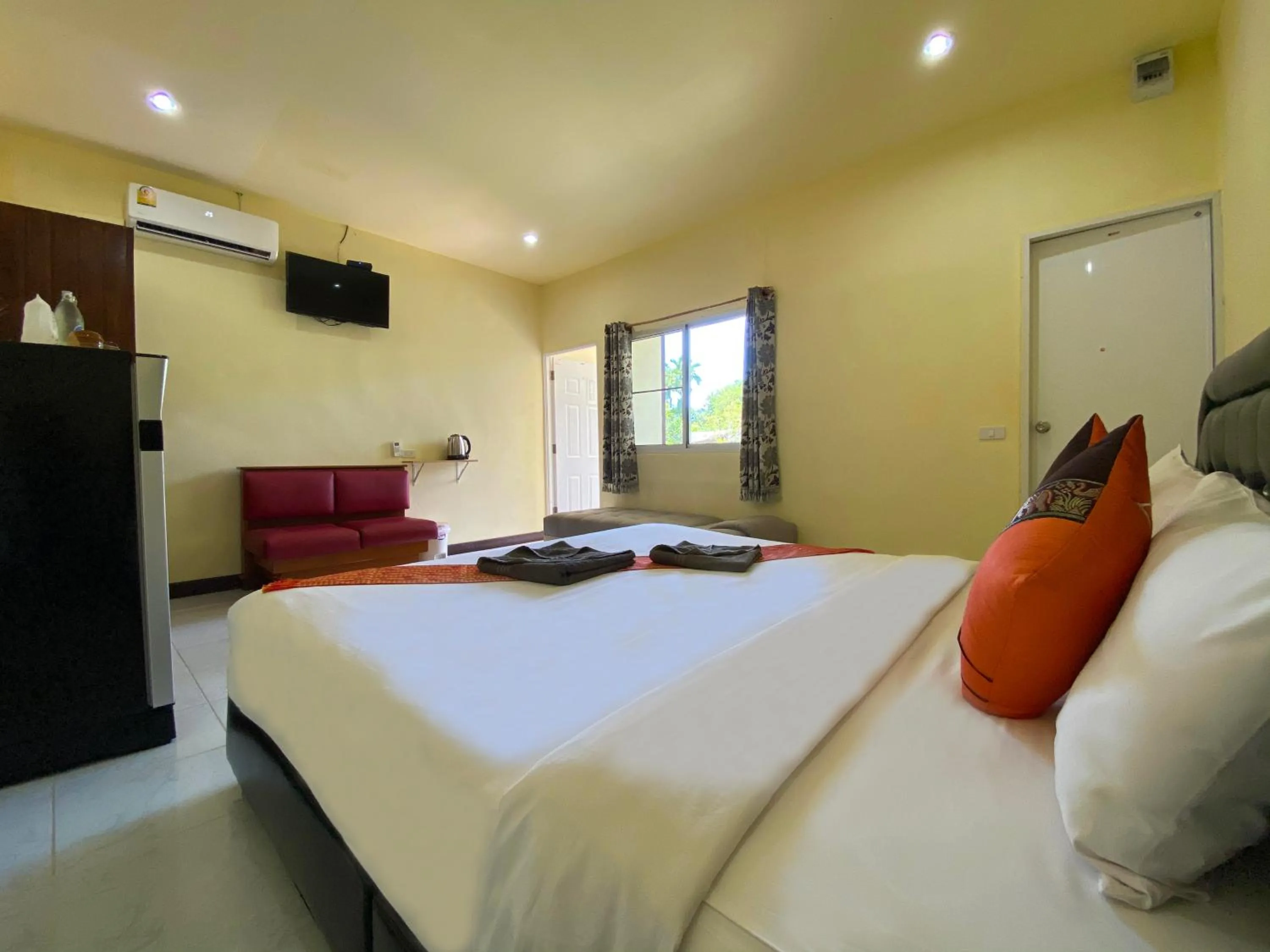 Bed in Everest Resort Samui - SHA Plus