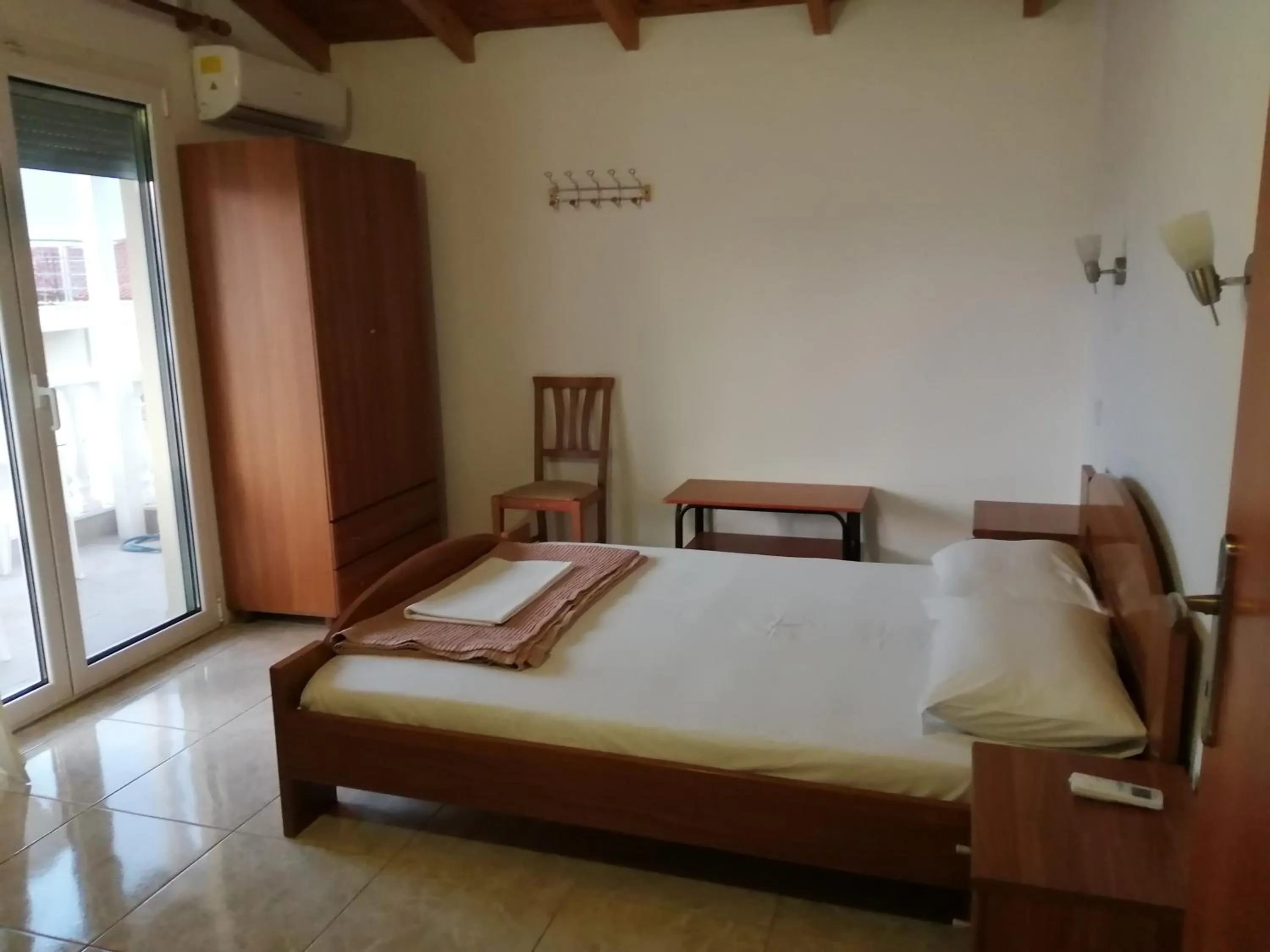 Bed in Irini Apartments