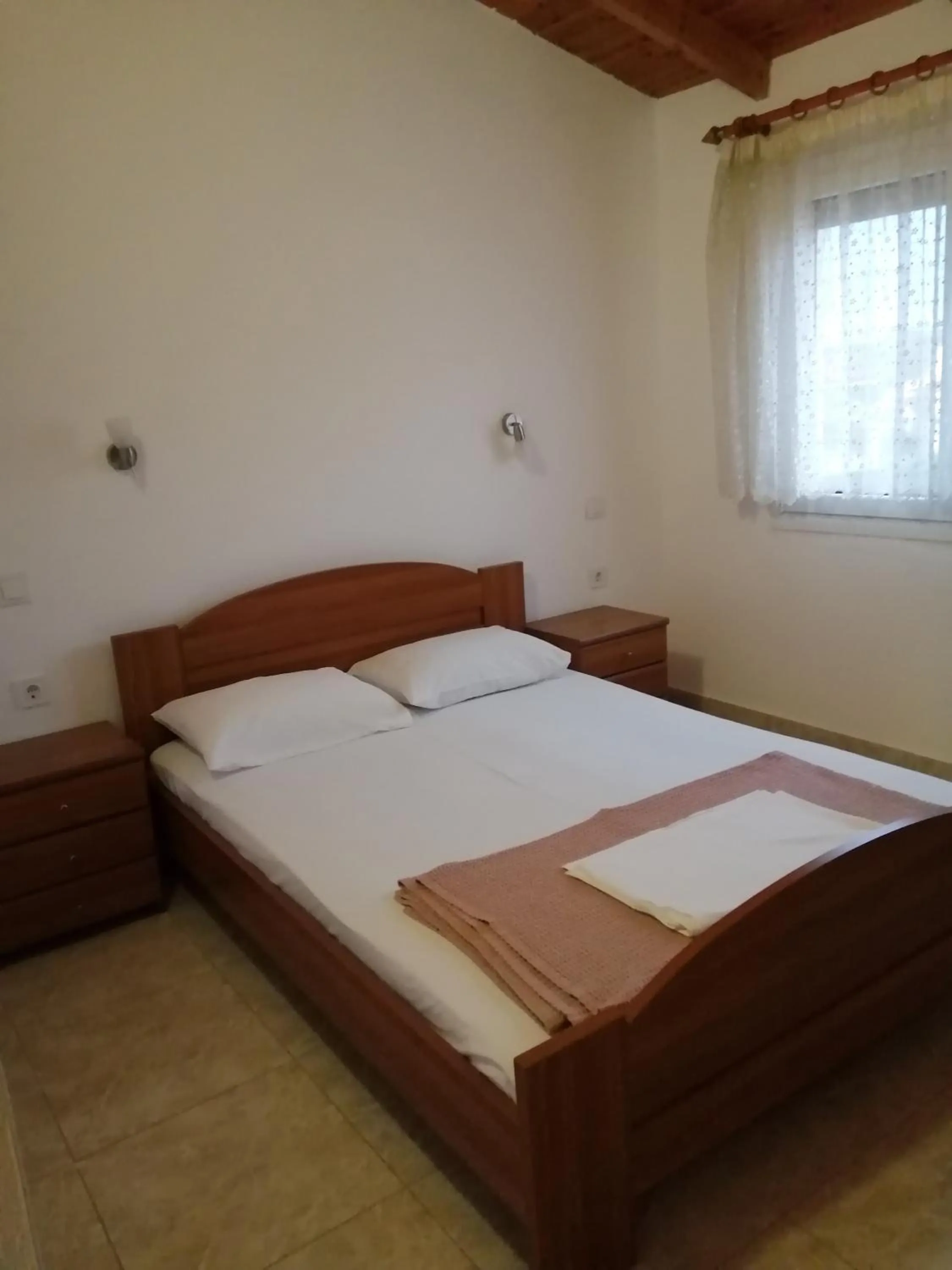 Bed in Irini Apartments