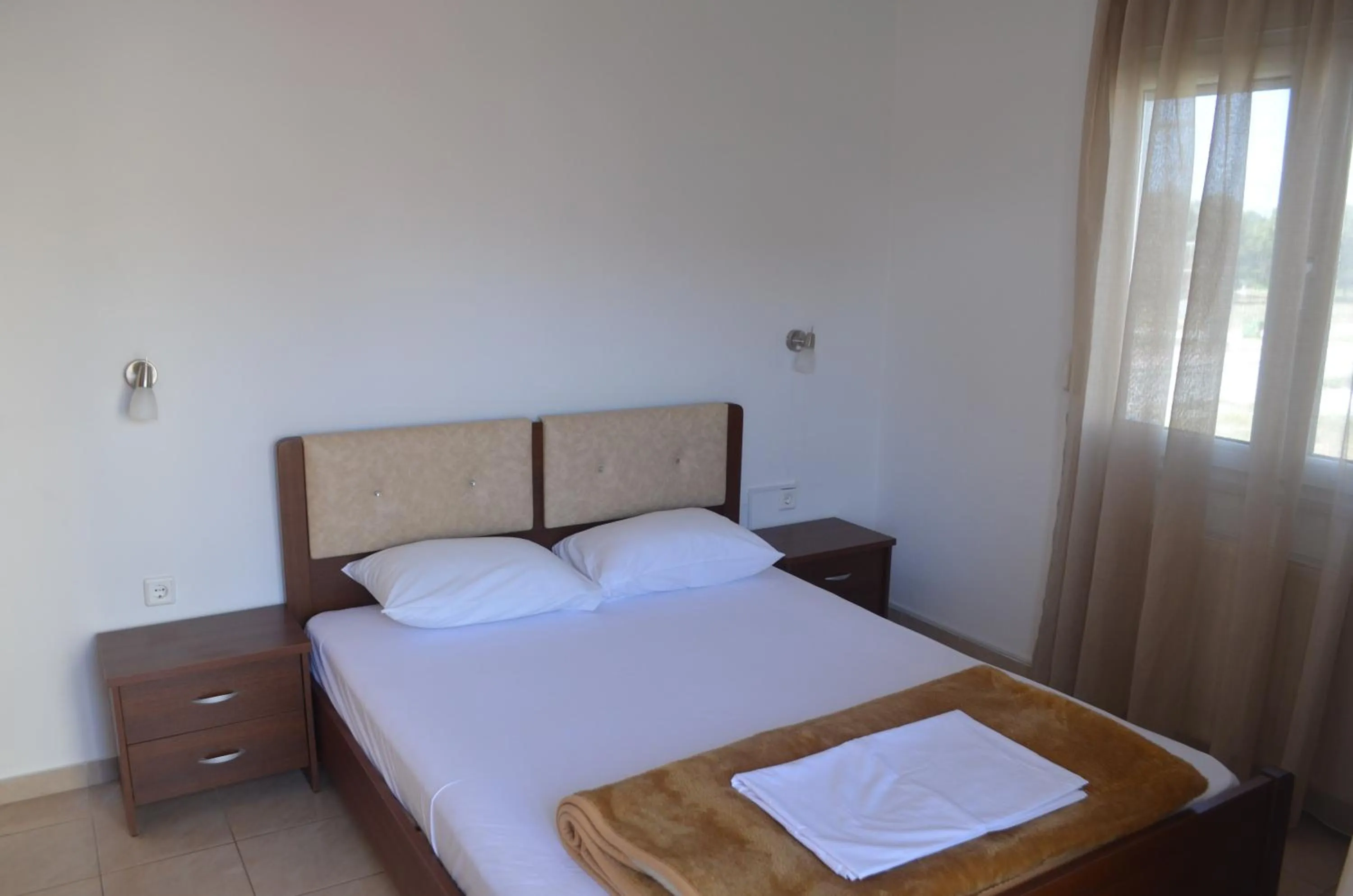 TV and multimedia, Bed in Irini Apartments