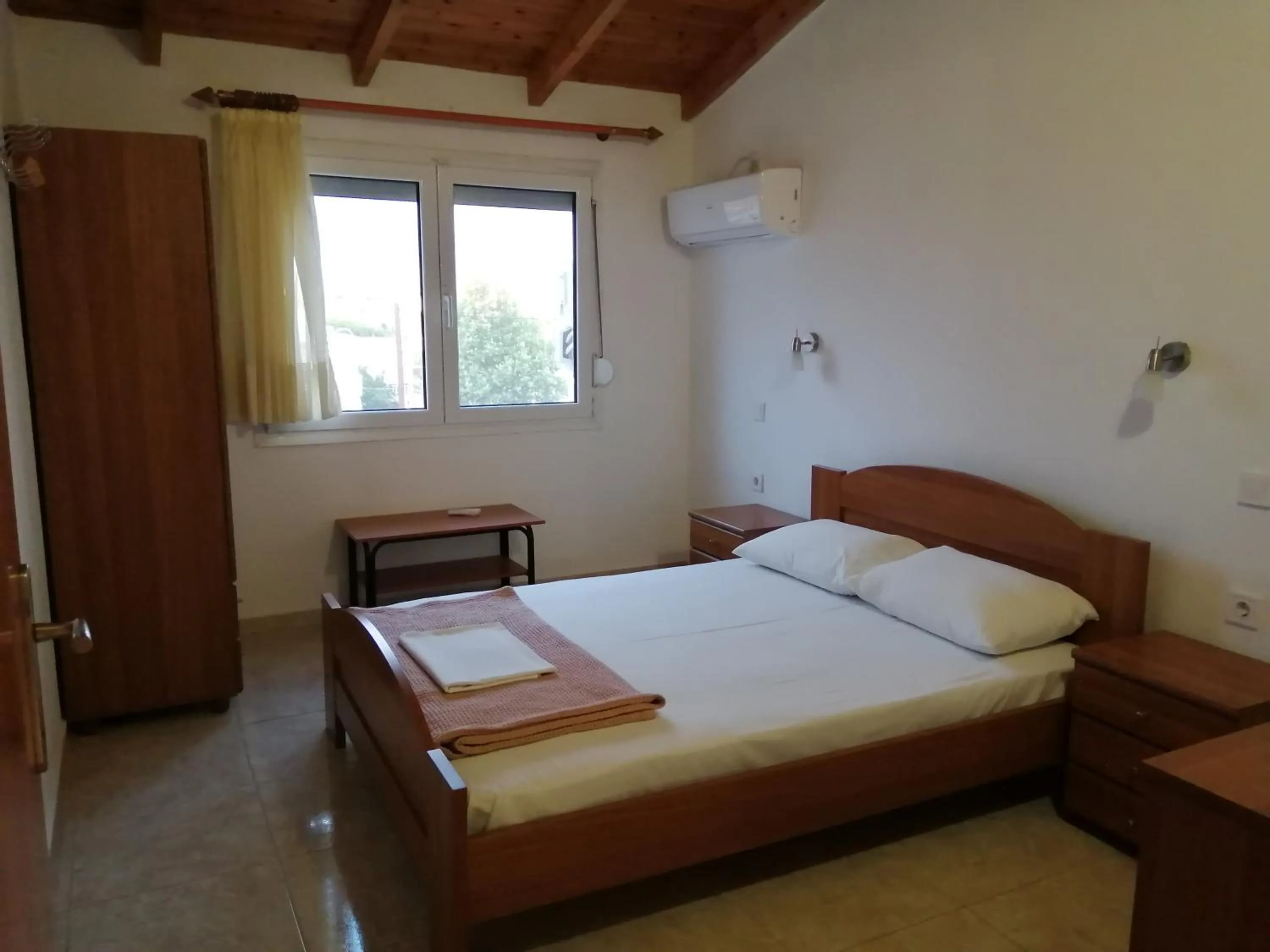 Bed in Irini Apartments