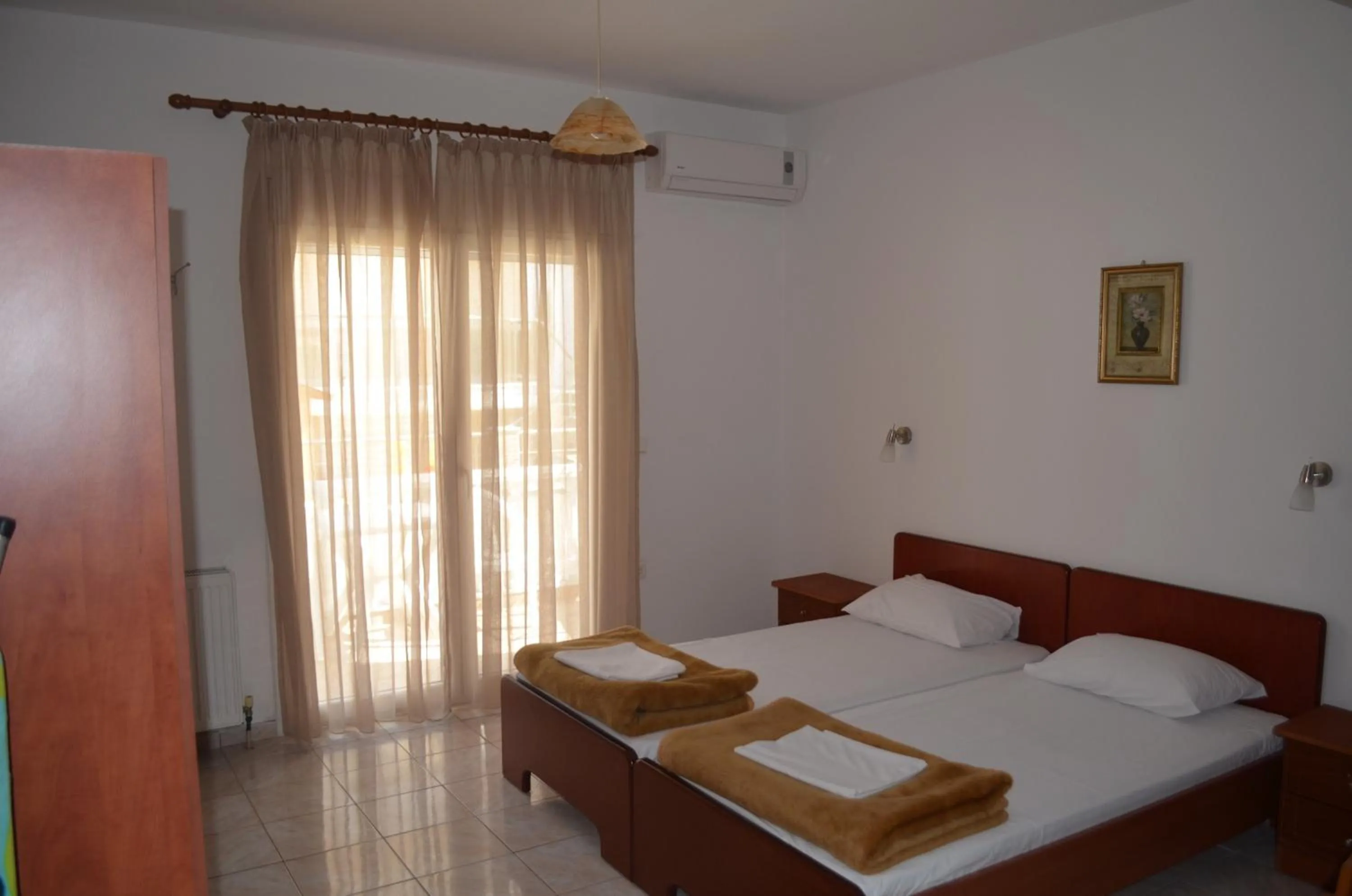 Bed in Irini Apartments