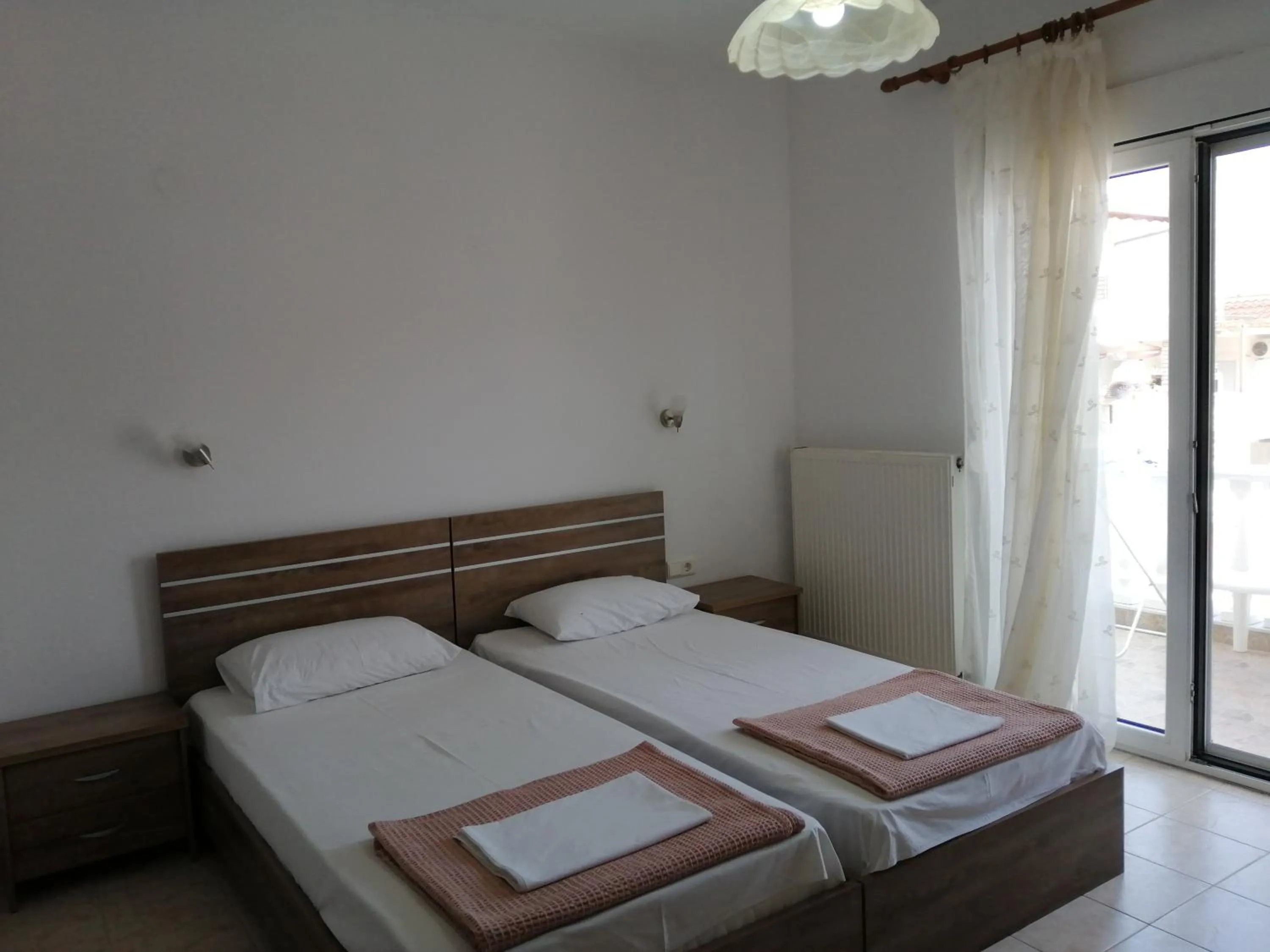 Bed in Irini Apartments