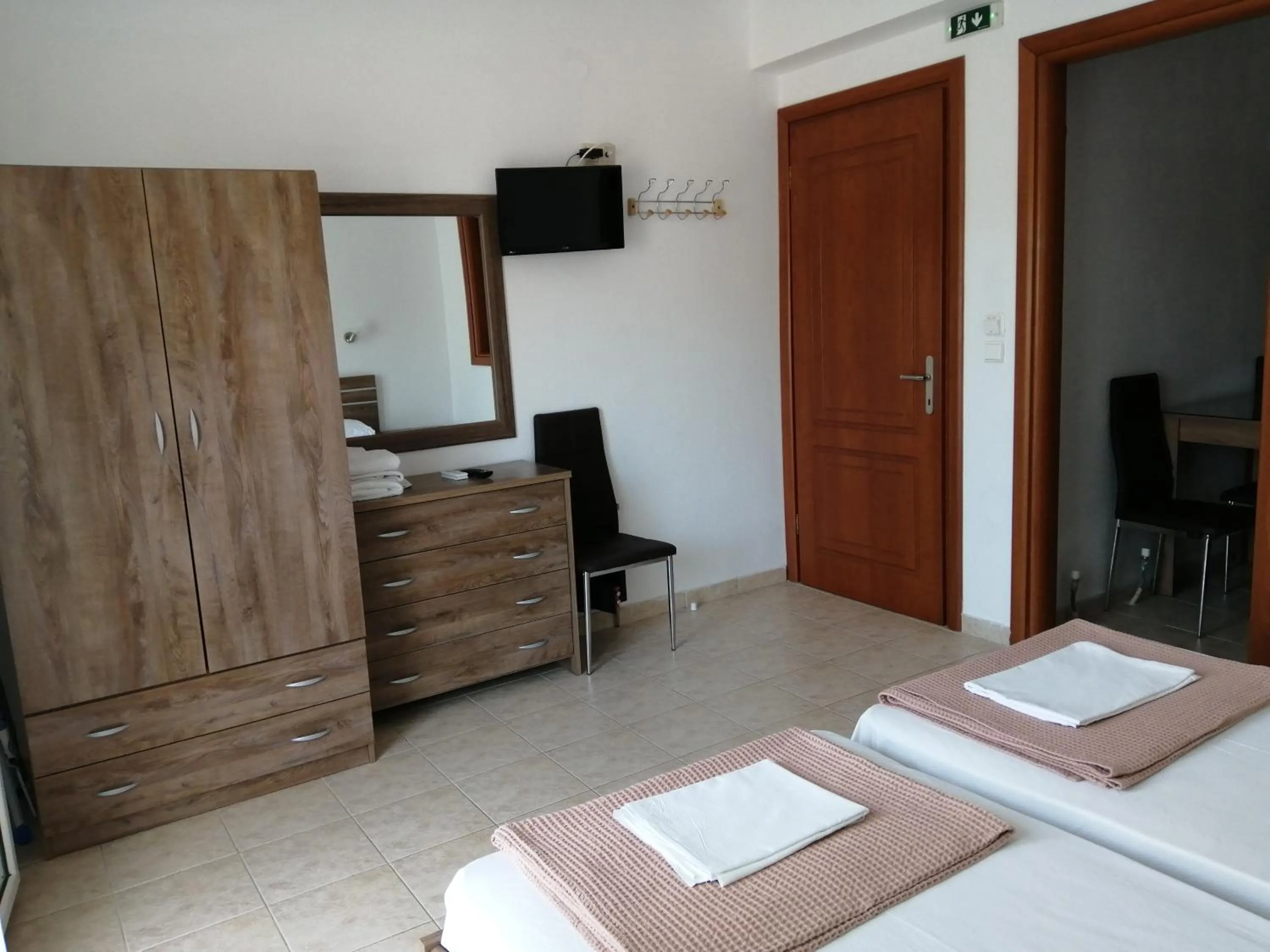 TV and multimedia, Bed in Irini Apartments