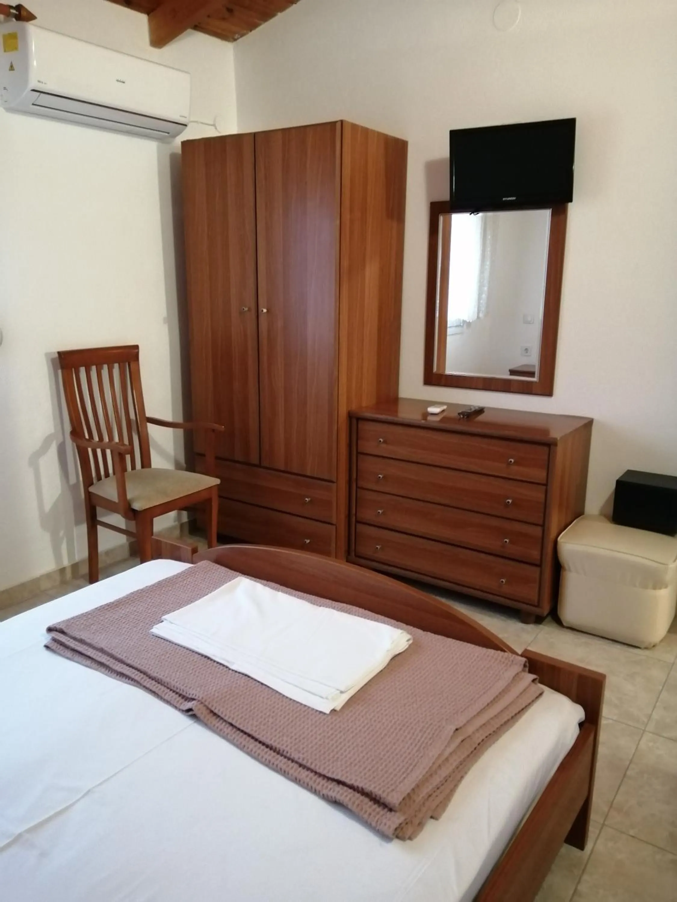 Bed in Irini Apartments