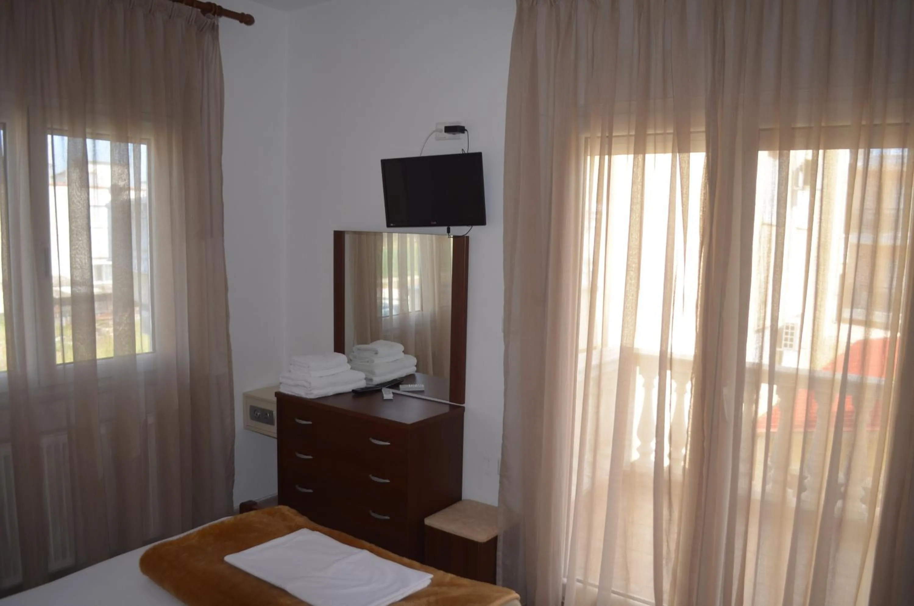 TV and multimedia, Bed in Irini Apartments