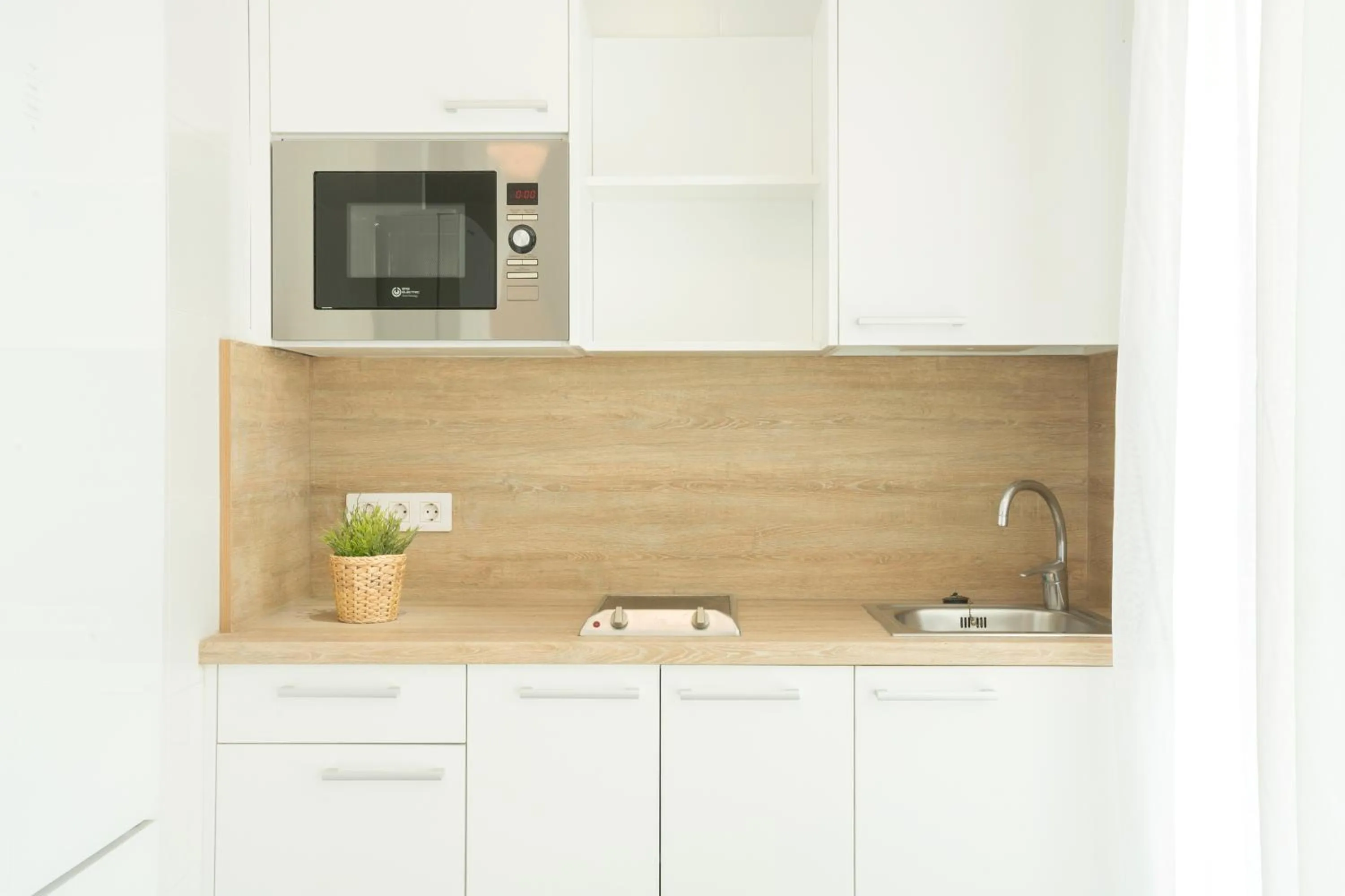 Kitchen or kitchenette in Bungalows Doña Rosa