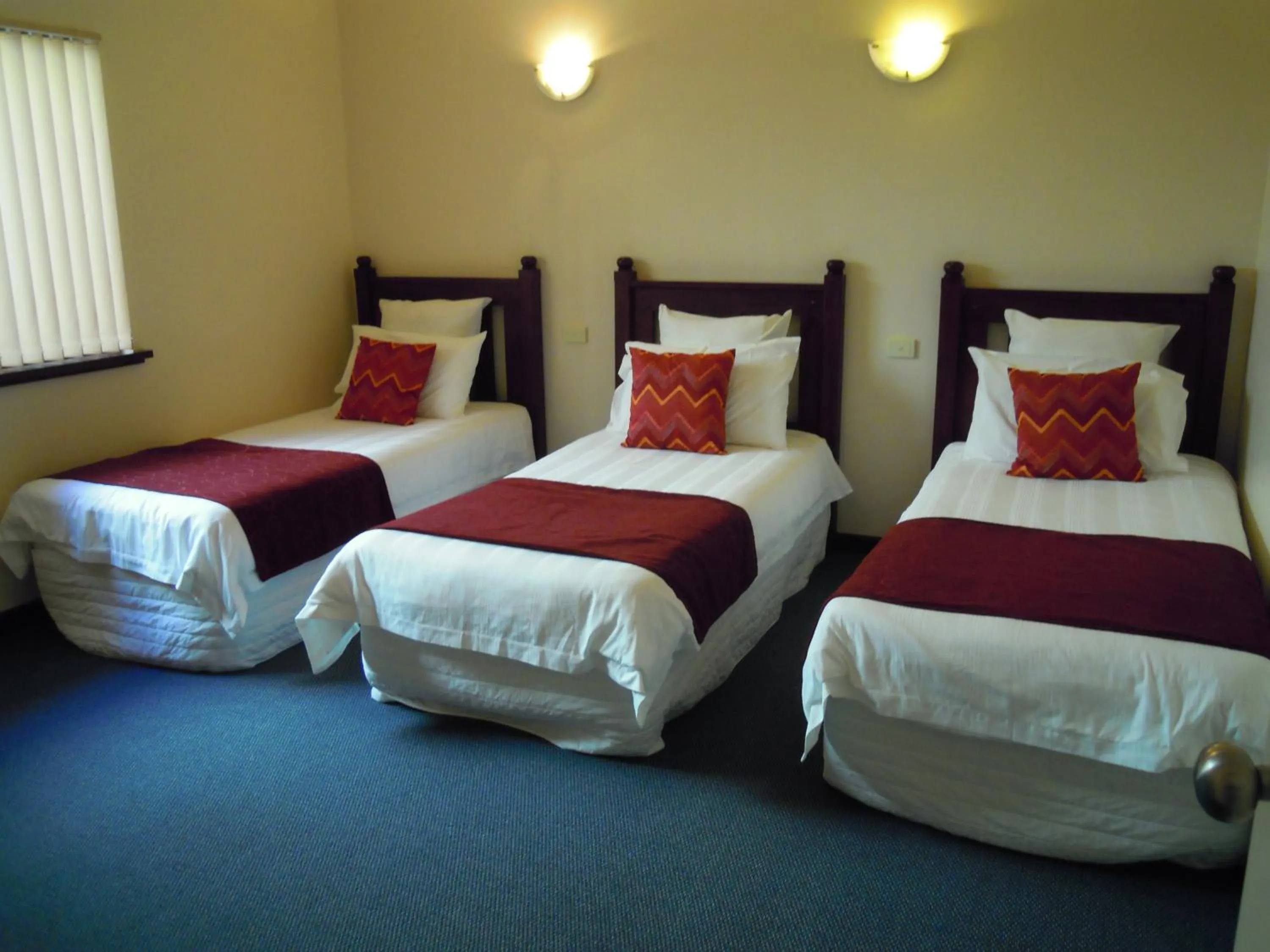 Bed in Tree Top Walk Motel