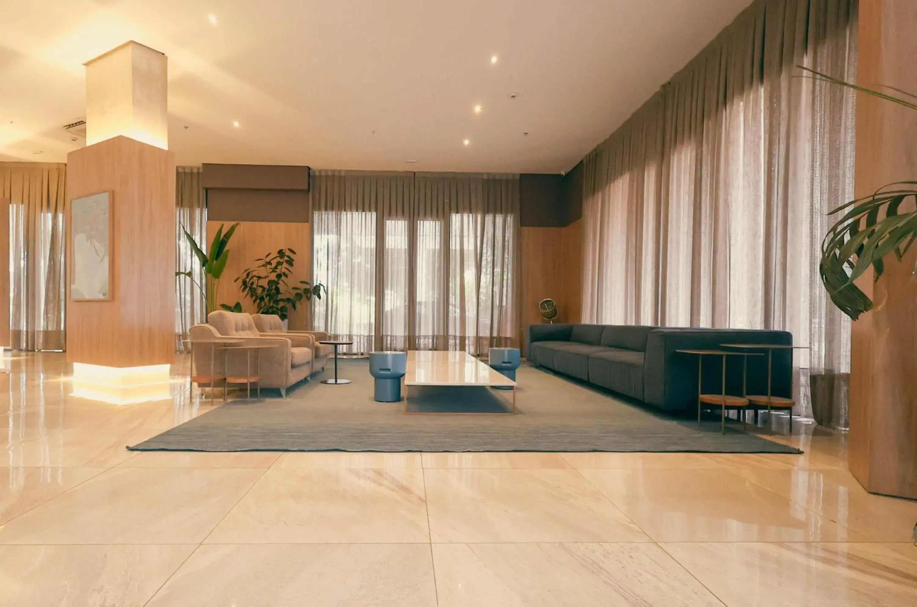 Lobby or reception in TRYP By Wyndham Ribeirão Preto Lobby or reception in TRYP By Wyndham Ribeirão Preto