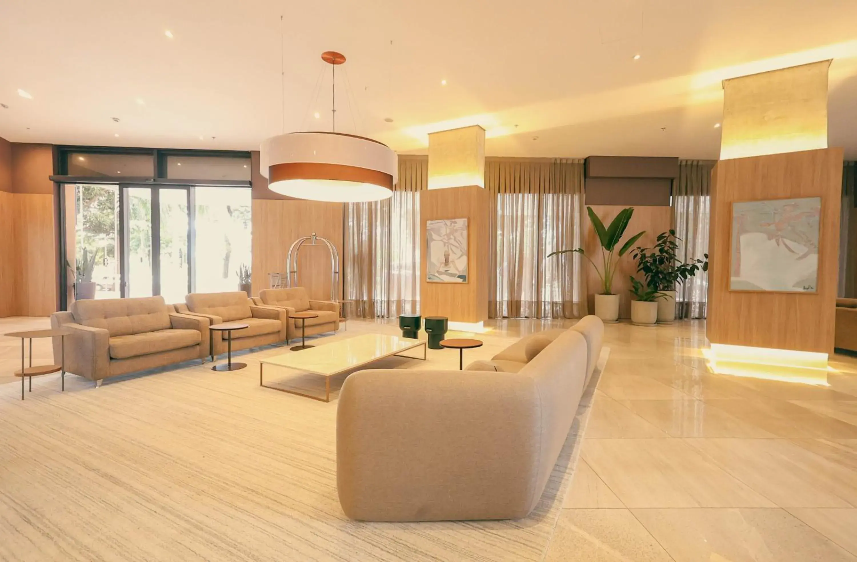 Lobby or reception in TRYP By Wyndham Ribeirão Preto Lobby or reception in TRYP By Wyndham Ribeirão Preto