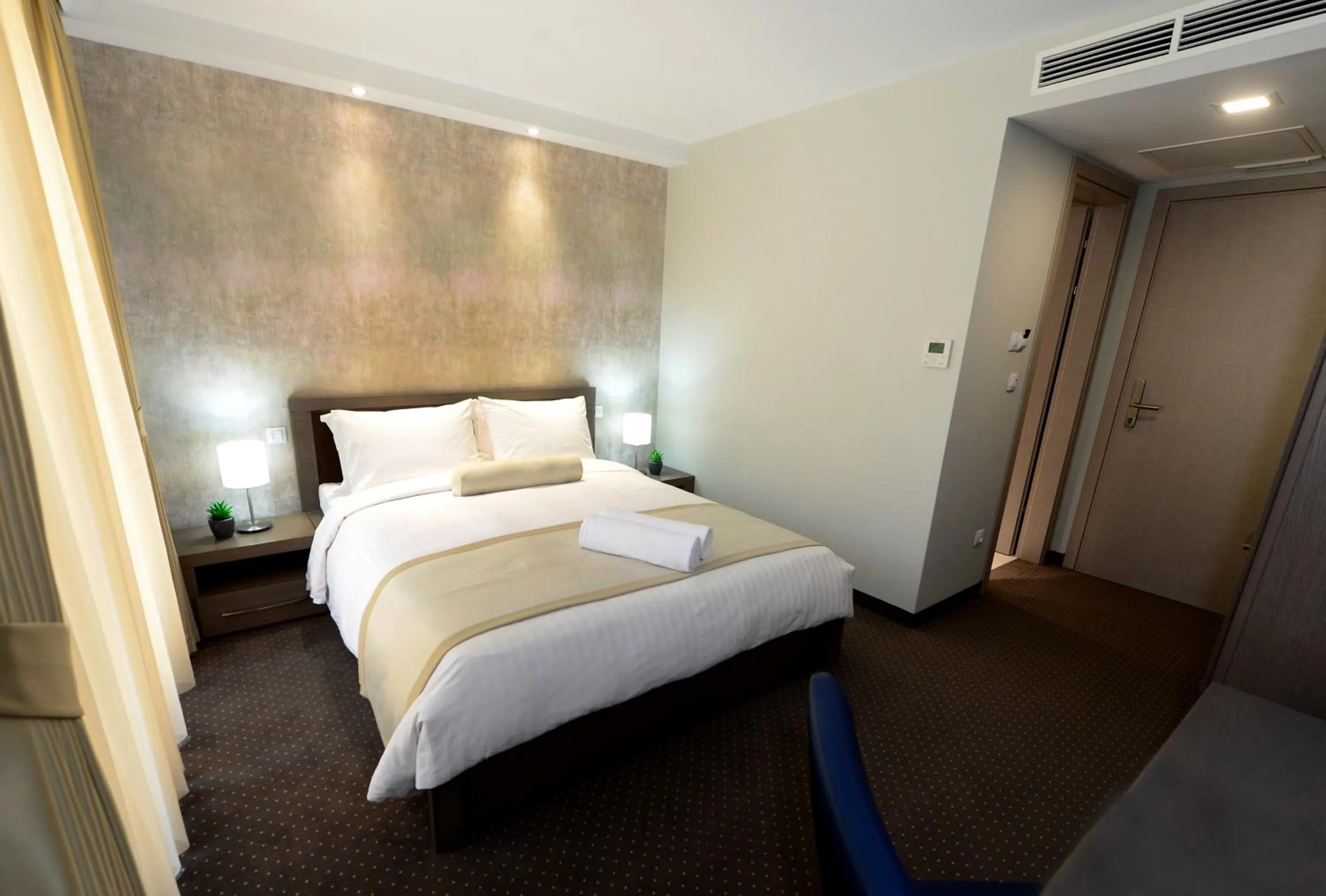 Photo of the whole room, Bed in Alexandar Square Boutique Hotel