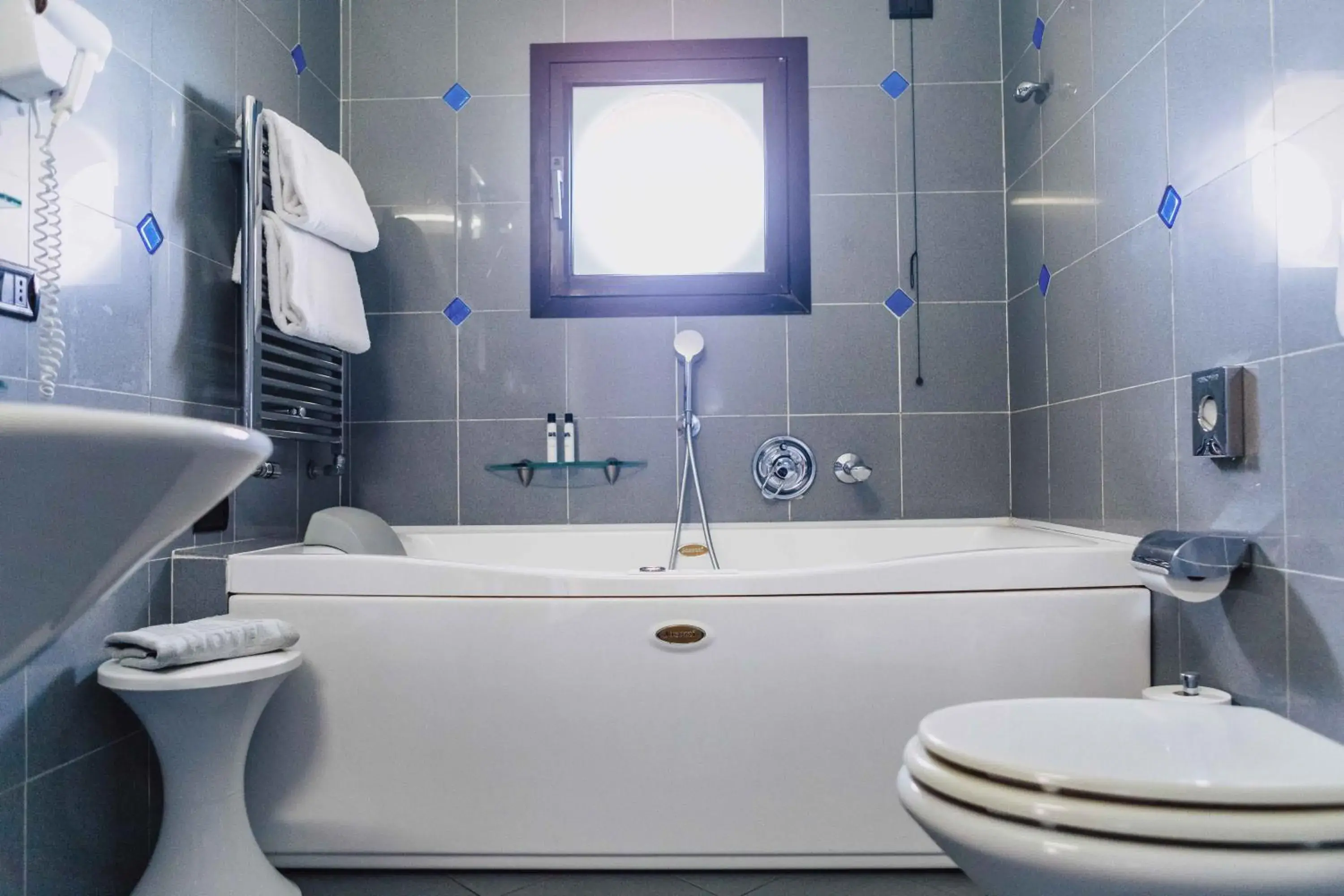 Bathroom in Mare Hotel Bathroom in Mare Hotel