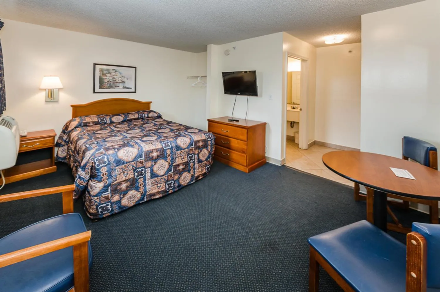 Bed in Tampa Bay Extended Stay Hotel
