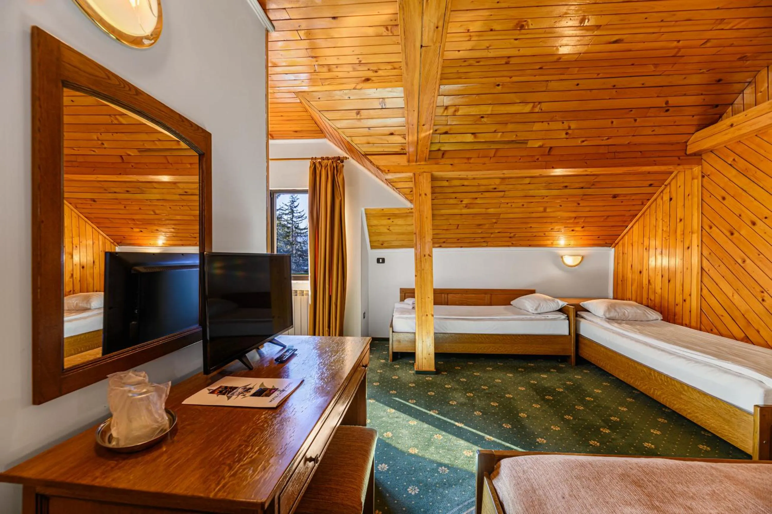 Bed in Hotel Casa Viorel jacuzzi & saunas