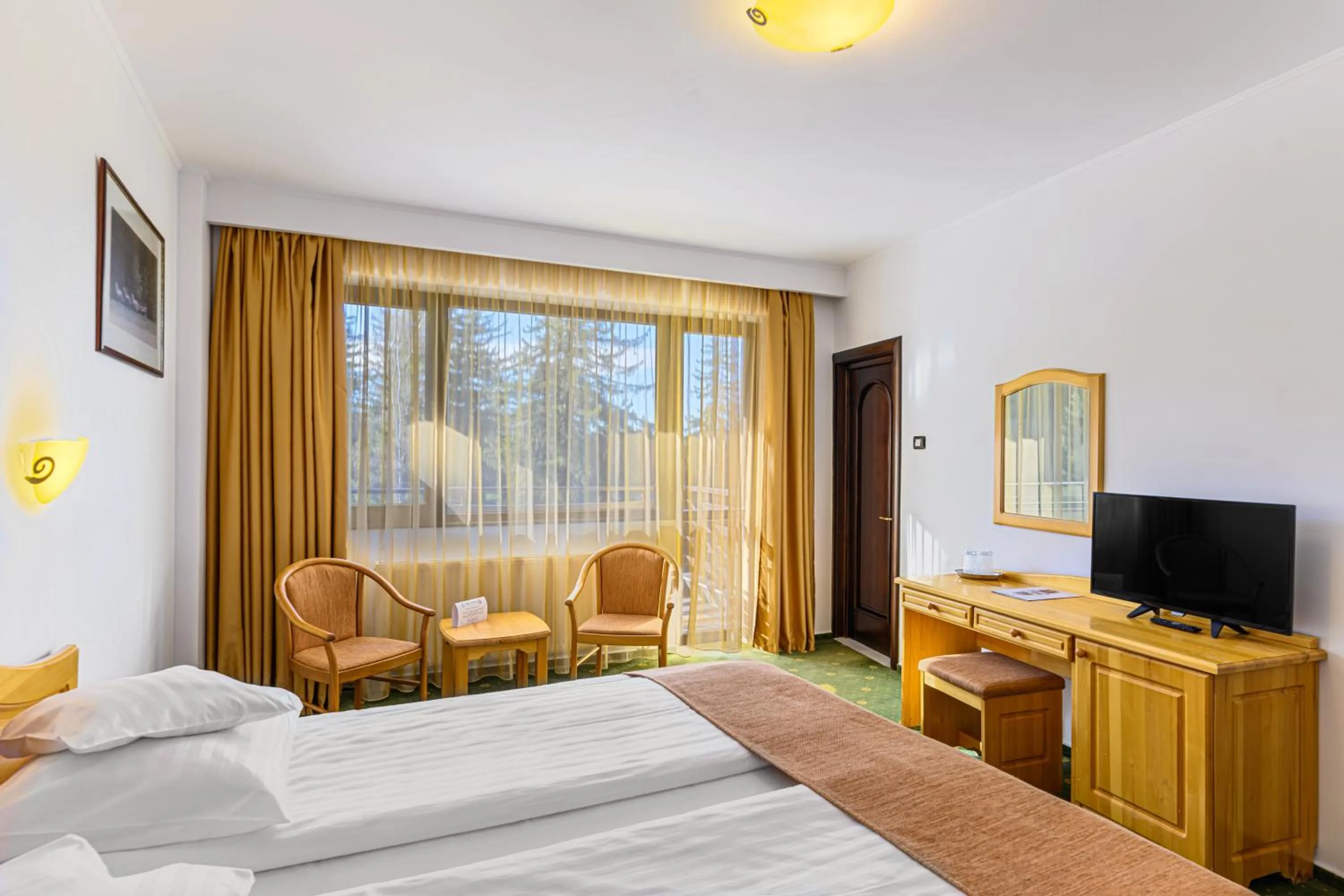 Bed in Hotel Casa Viorel jacuzzi & saunas