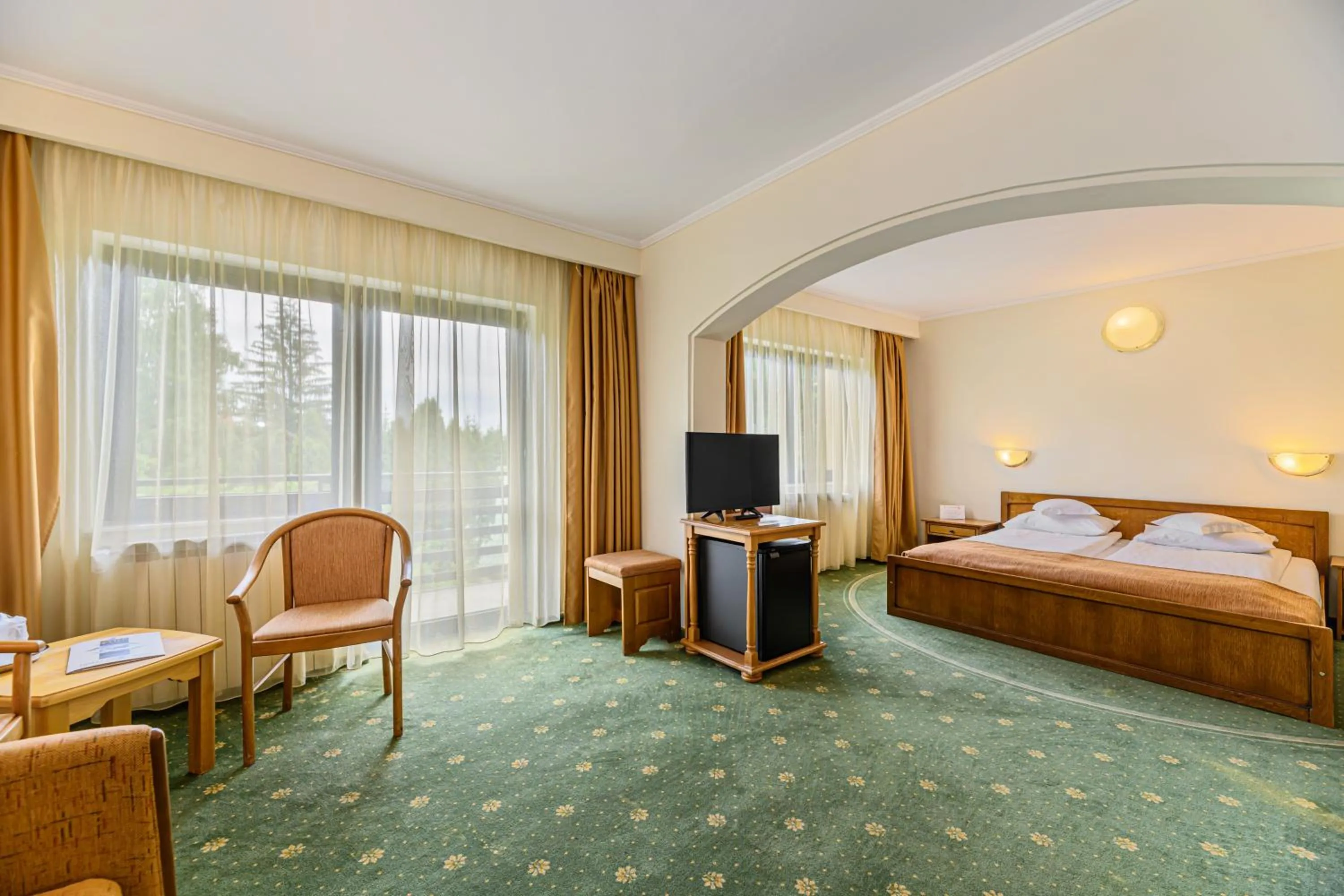 Bed in Hotel Casa Viorel jacuzzi & saunas