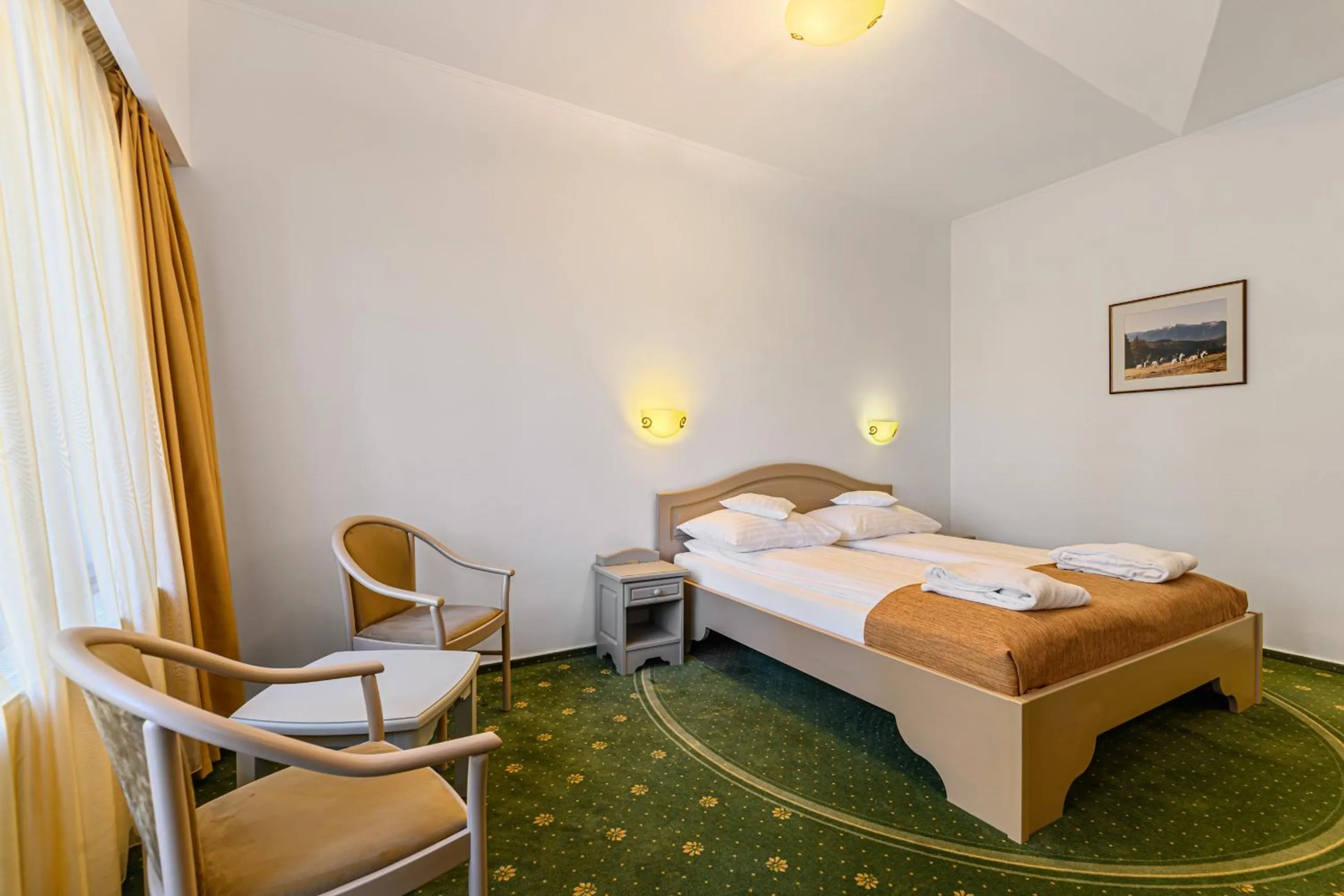 Bed in Hotel Casa Viorel jacuzzi & saunas