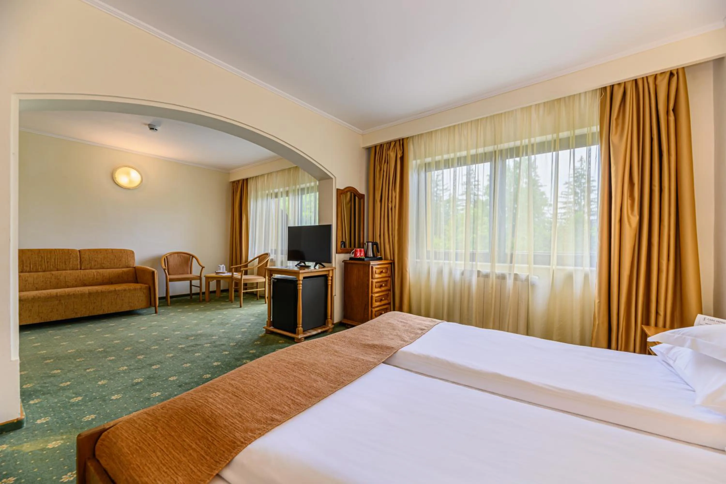 Bed in Hotel Casa Viorel jacuzzi & saunas