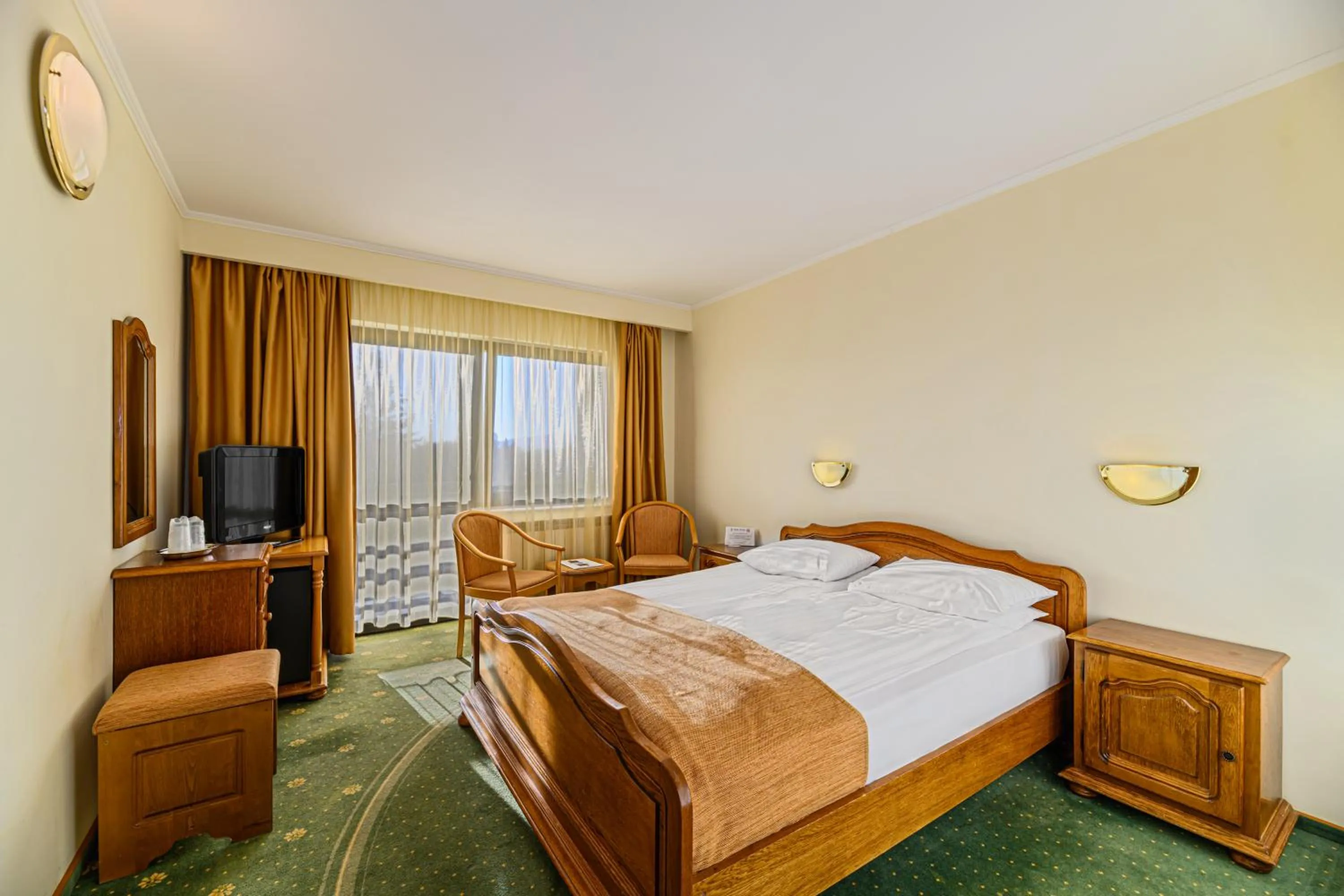 Bed in Hotel Casa Viorel jacuzzi & saunas