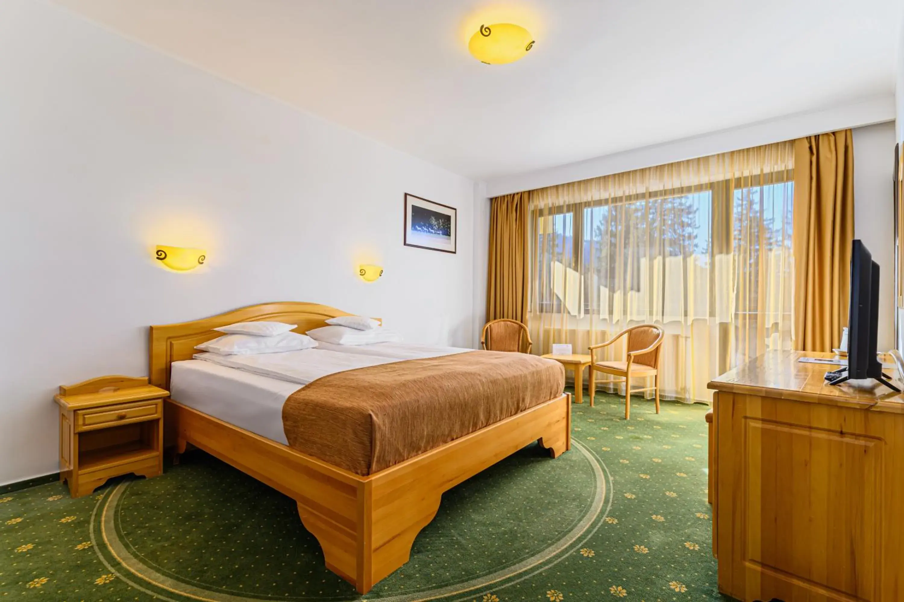 Bed in Hotel Casa Viorel jacuzzi & saunas Bed in Hotel Casa Viorel jacuzzi & saunas