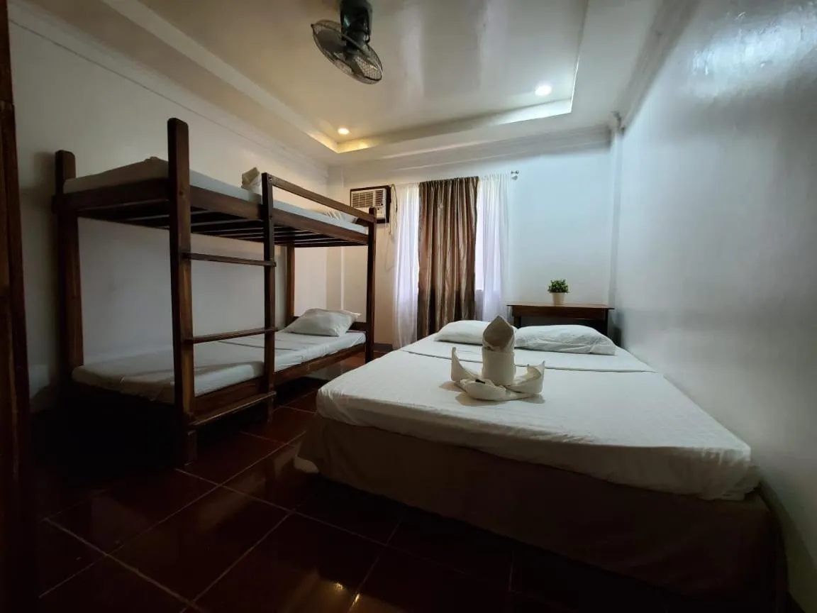 Bed in Ricardo Valley Inn