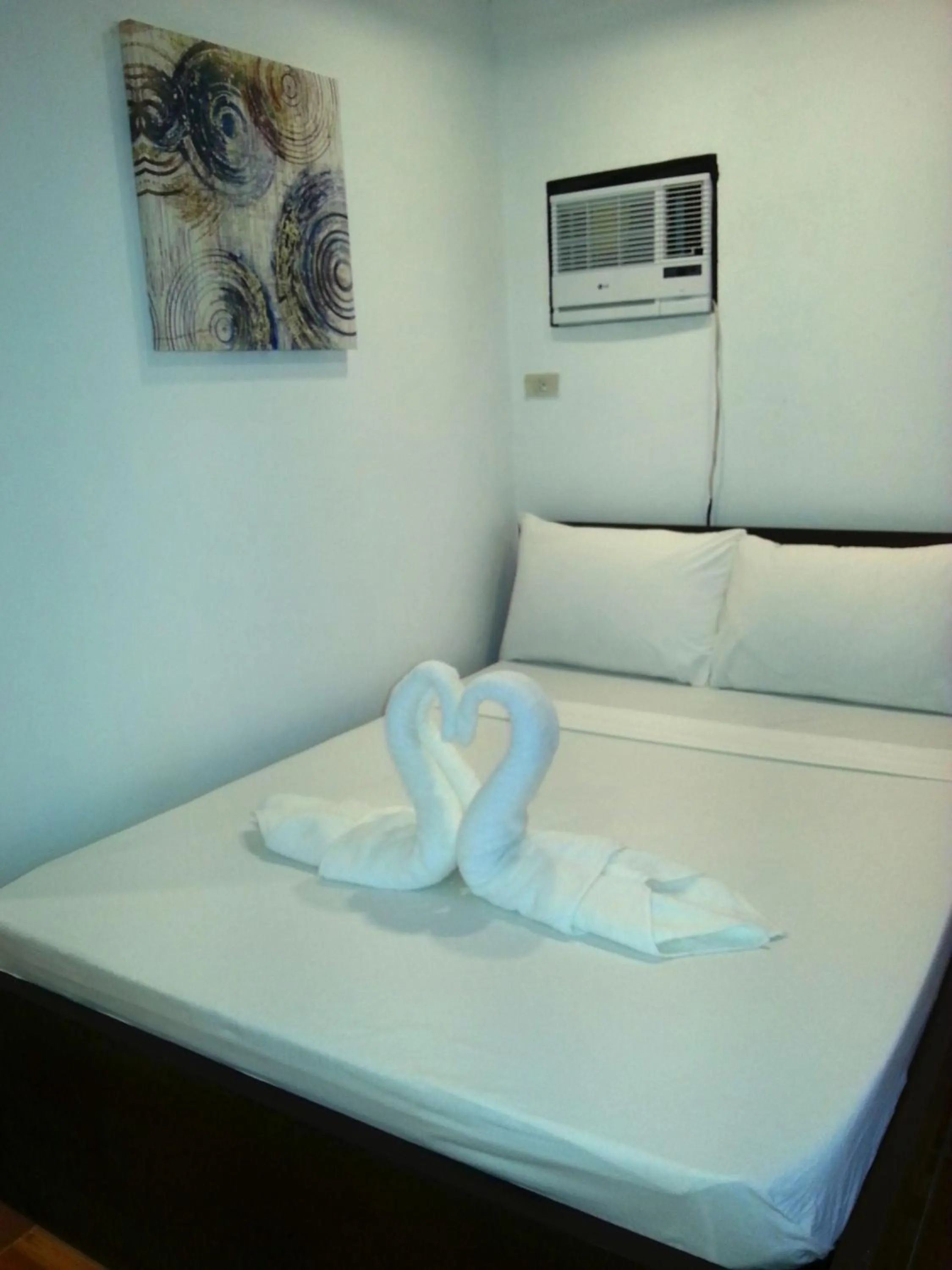 Bed in Ricardo Valley Inn