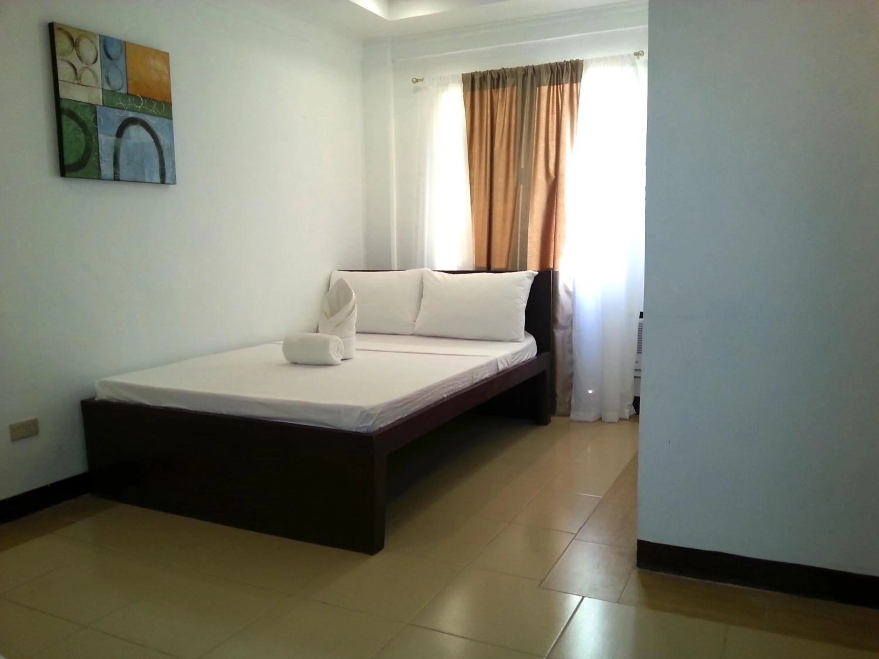 Bed in Ricardo Valley Inn