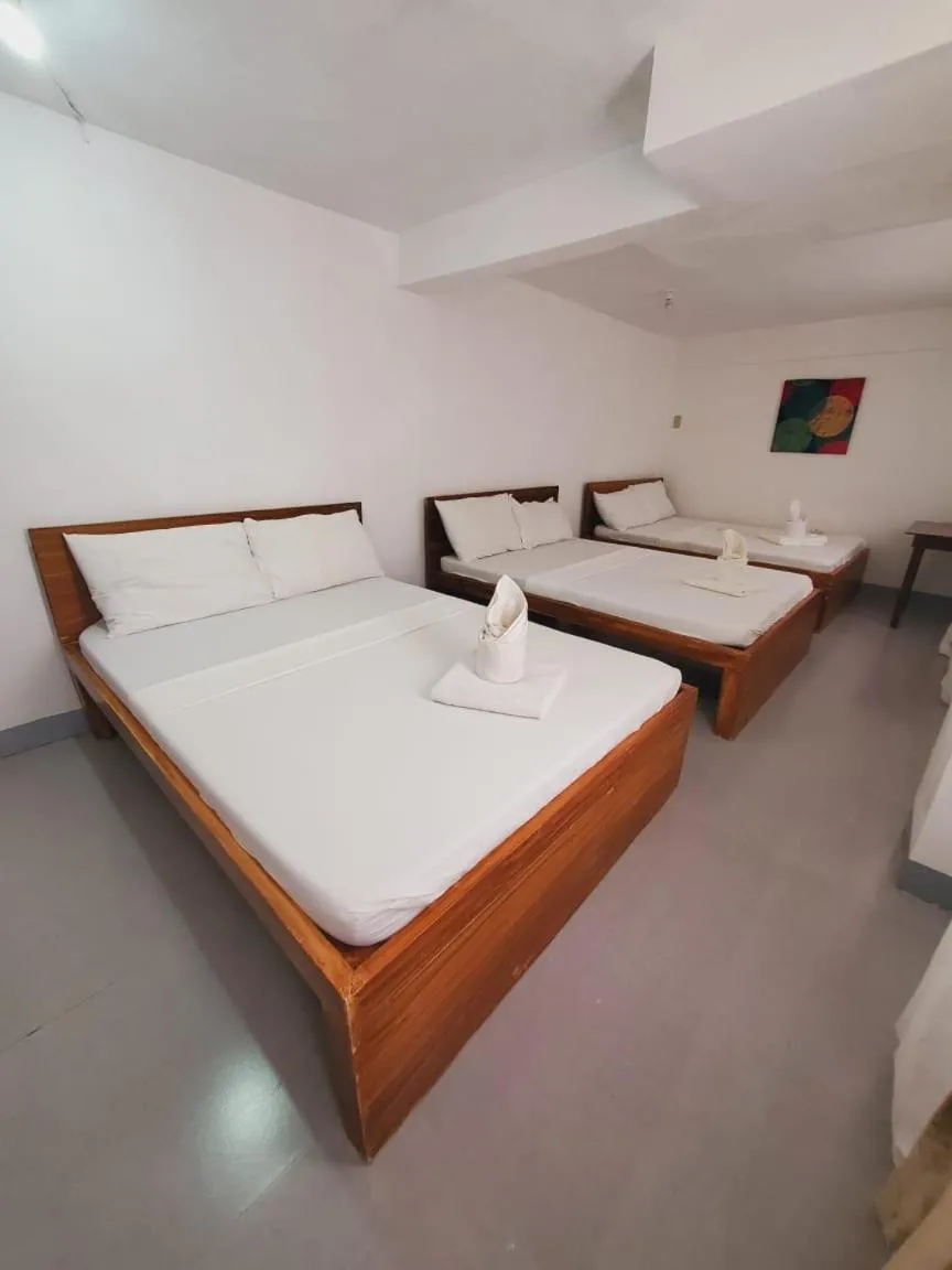 Bed in Ricardo Valley Inn