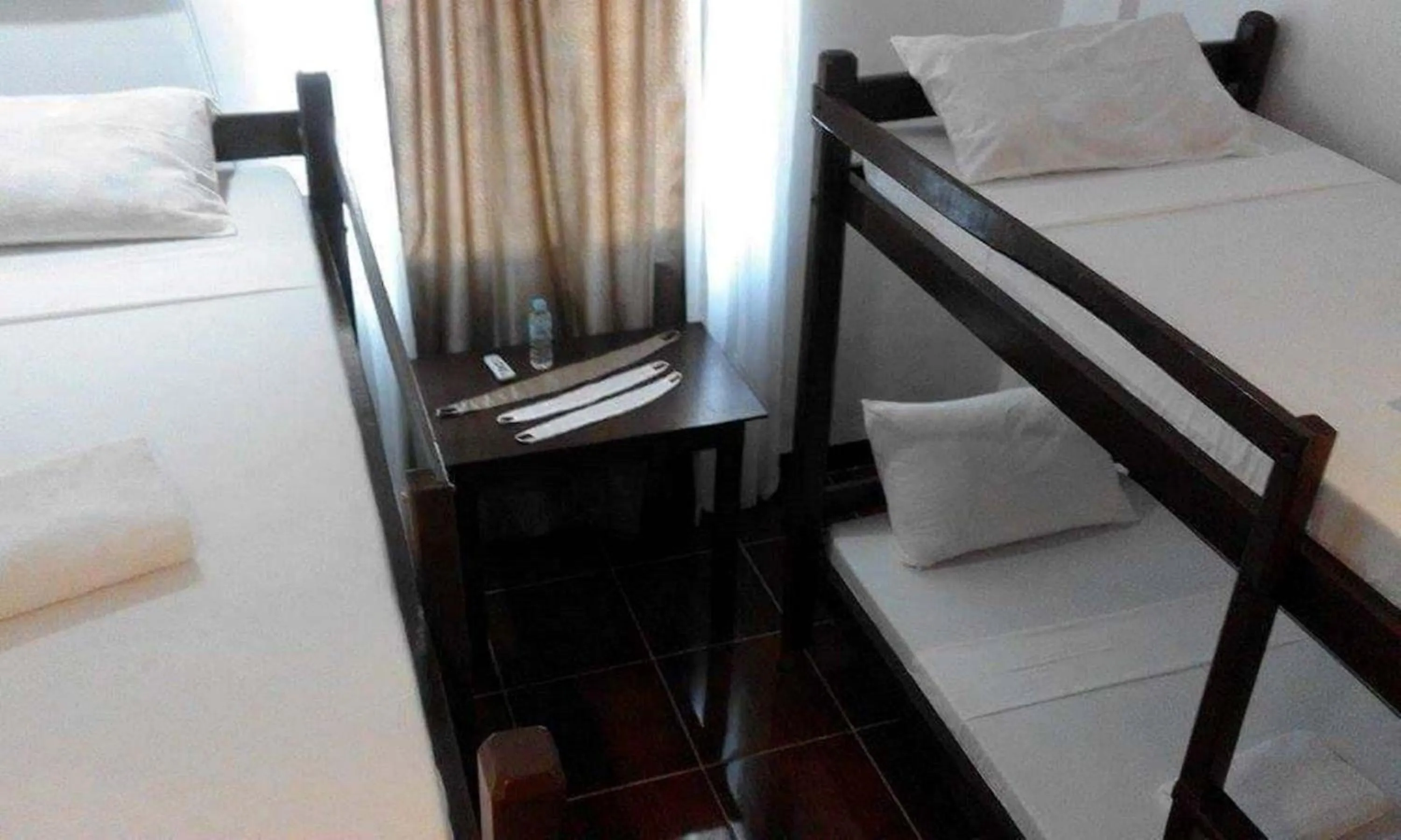 Bed in Ricardo Valley Inn