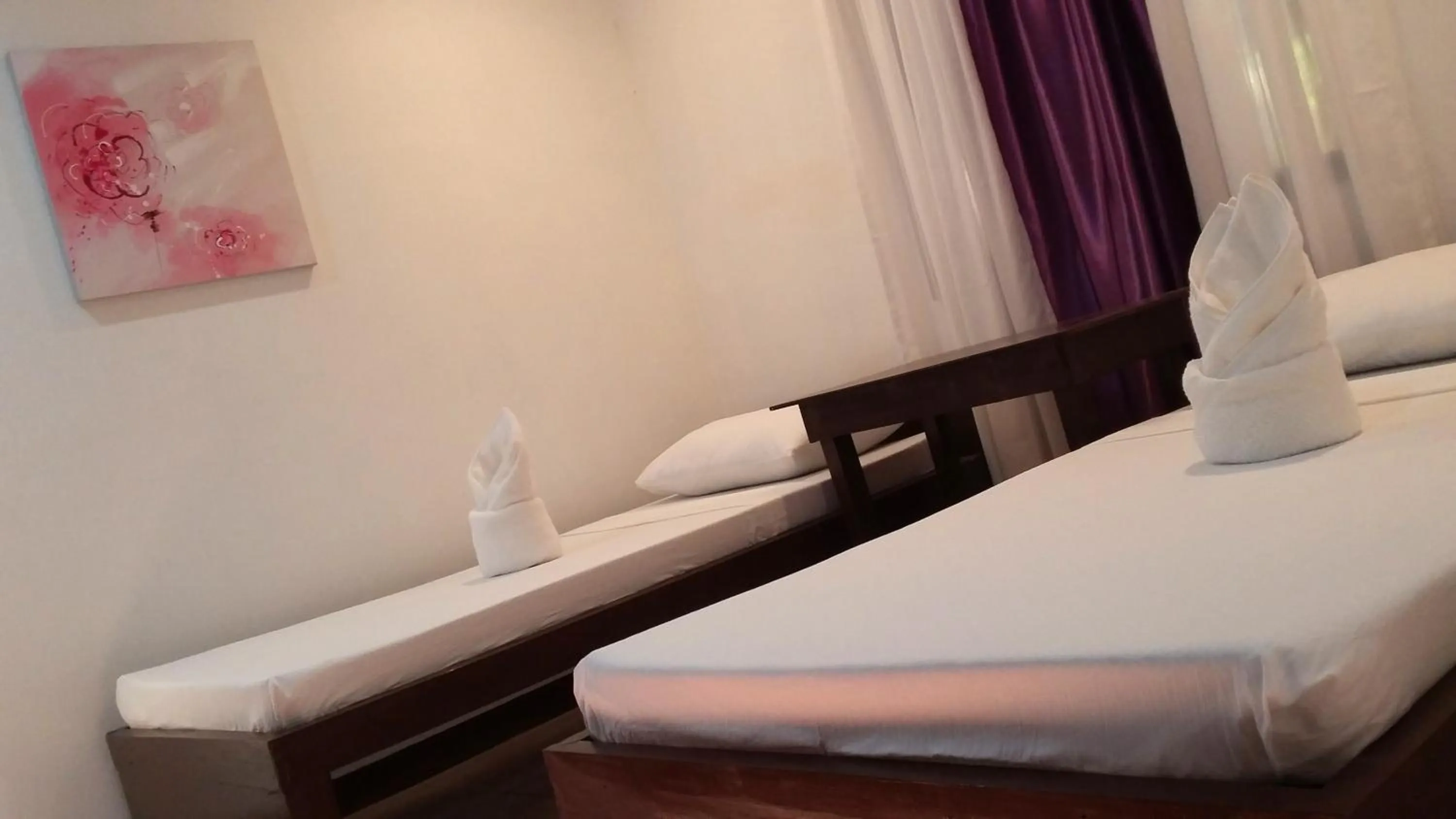 Bed in Ricardo Valley Inn