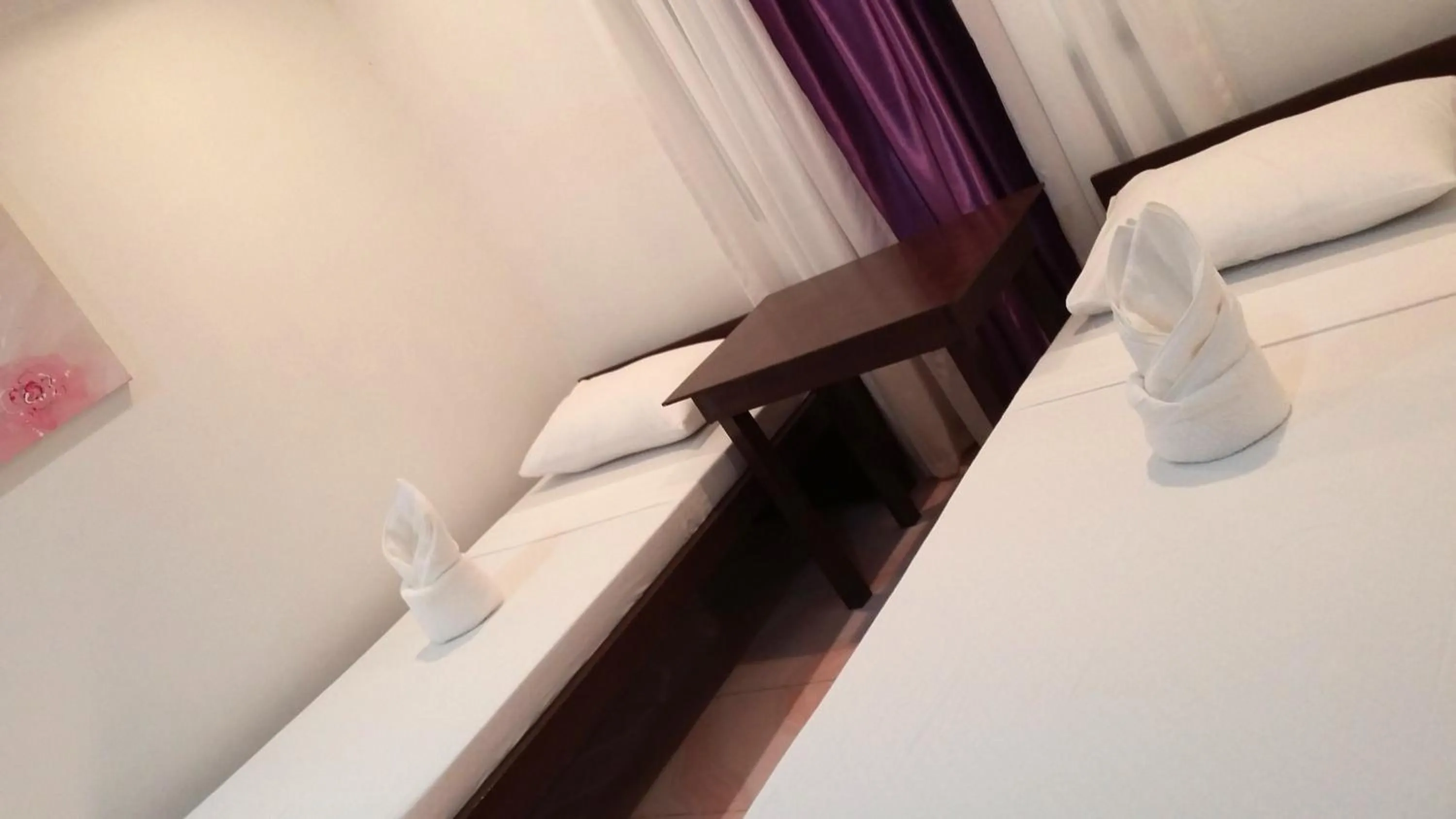 Bed in Ricardo Valley Inn