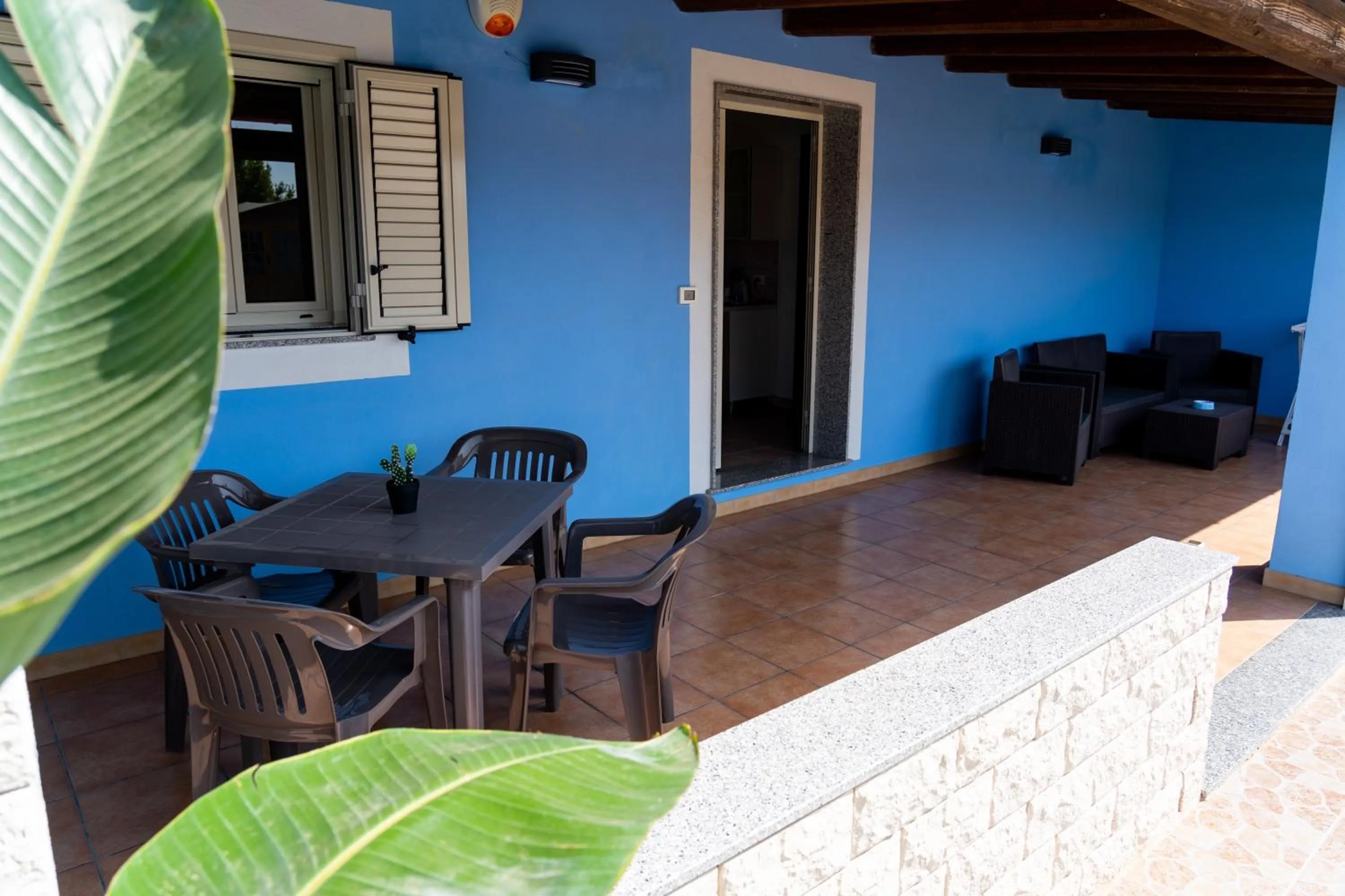 Patio in B&B L'Uliveto Rooms & Pool