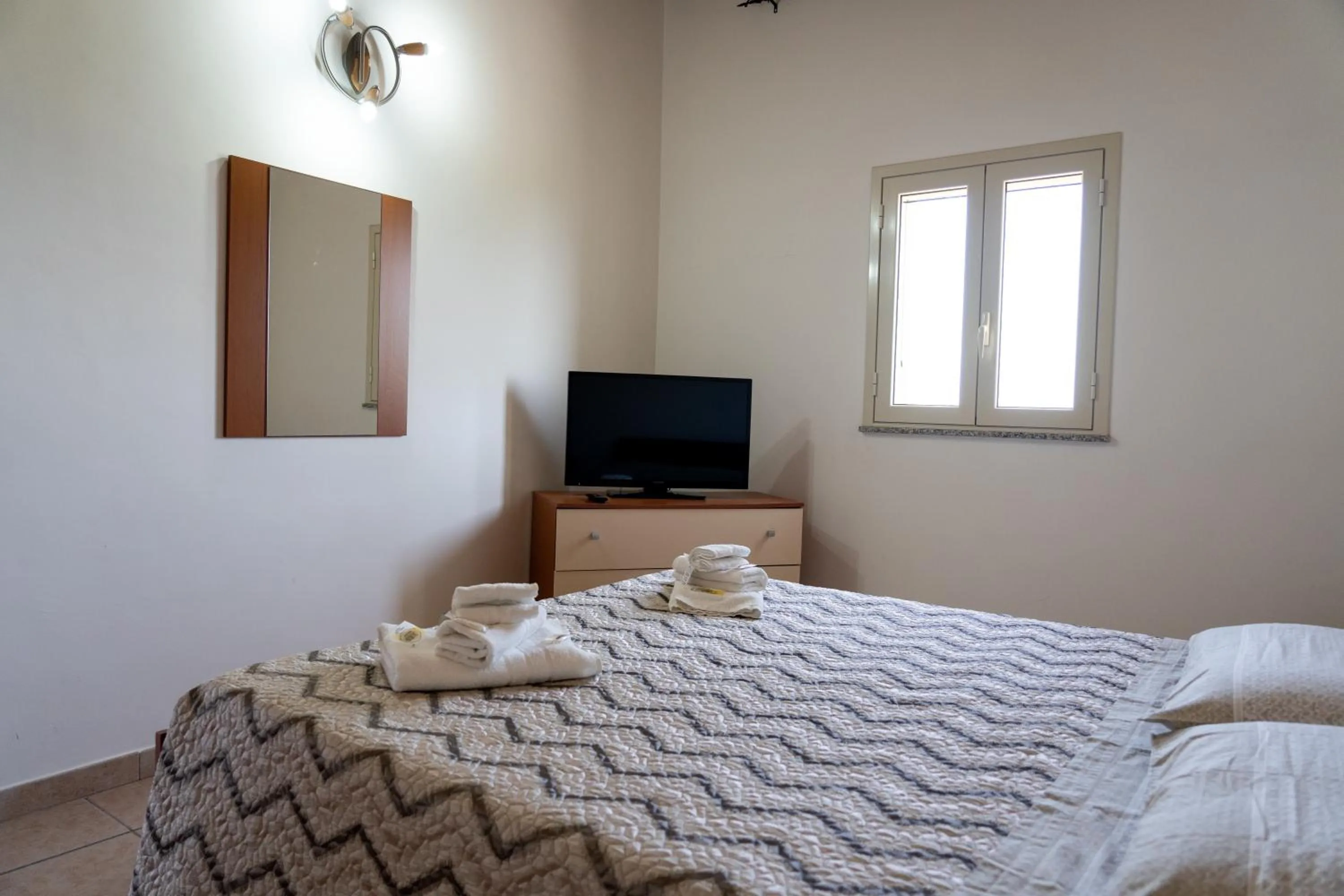 Photo of the whole room, Bed in B&B L'Uliveto Rooms & Pool
